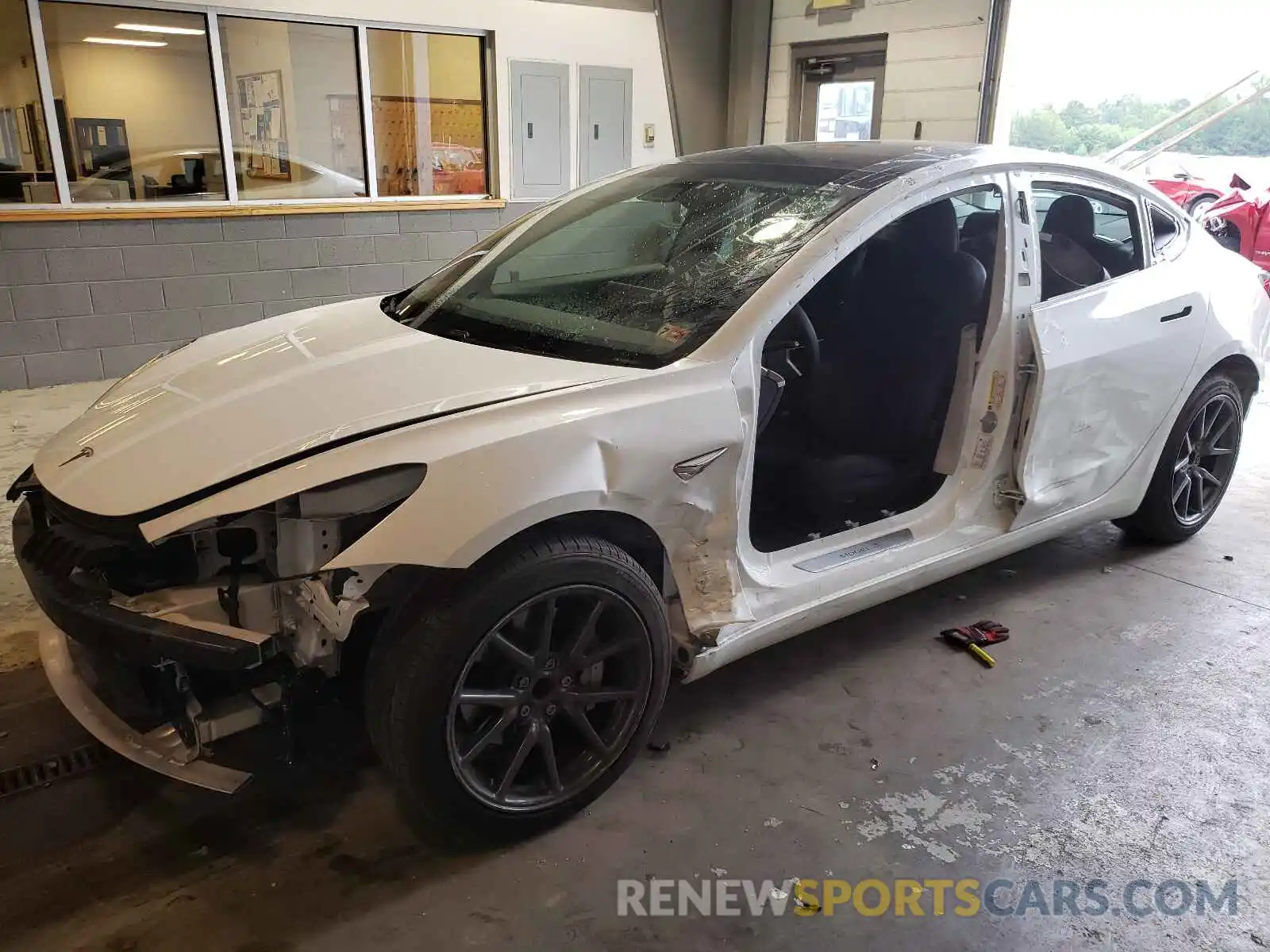 2 Photograph of a damaged car 5YJ3E1EA9LF706945 TESLA MODEL 3 2020