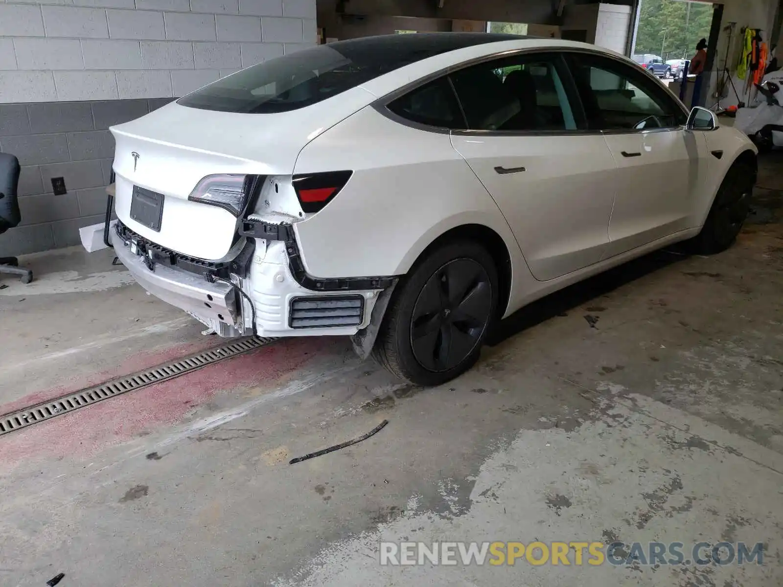 4 Photograph of a damaged car 5YJ3E1EA9LF706945 TESLA MODEL 3 2020