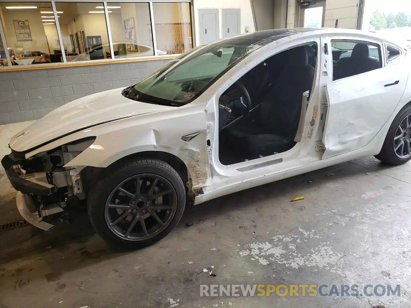 9 Photograph of a damaged car 5YJ3E1EA9LF706945 TESLA MODEL 3 2020