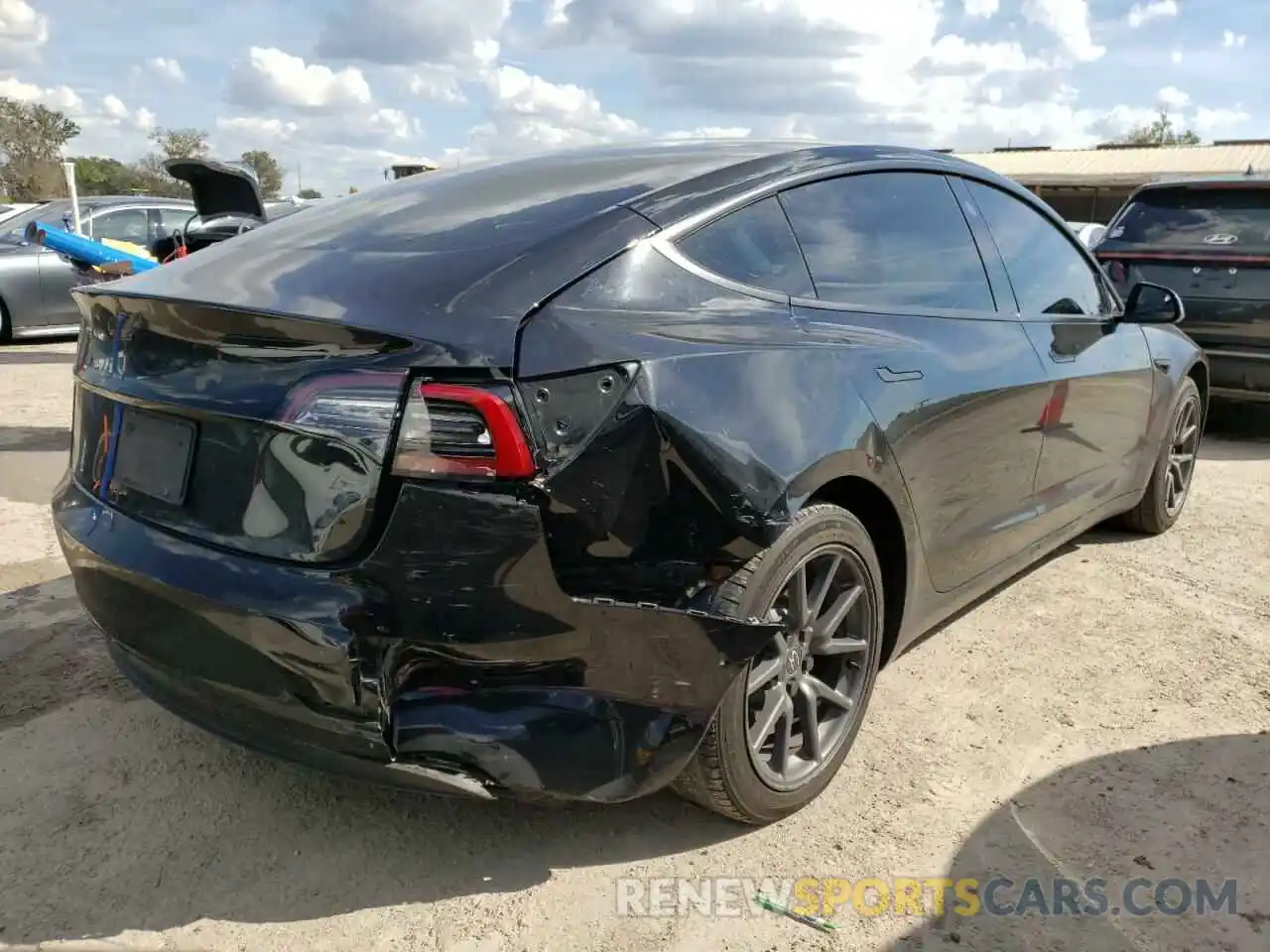 4 Photograph of a damaged car 5YJ3E1EA9LF736575 TESLA MODEL 3 2020