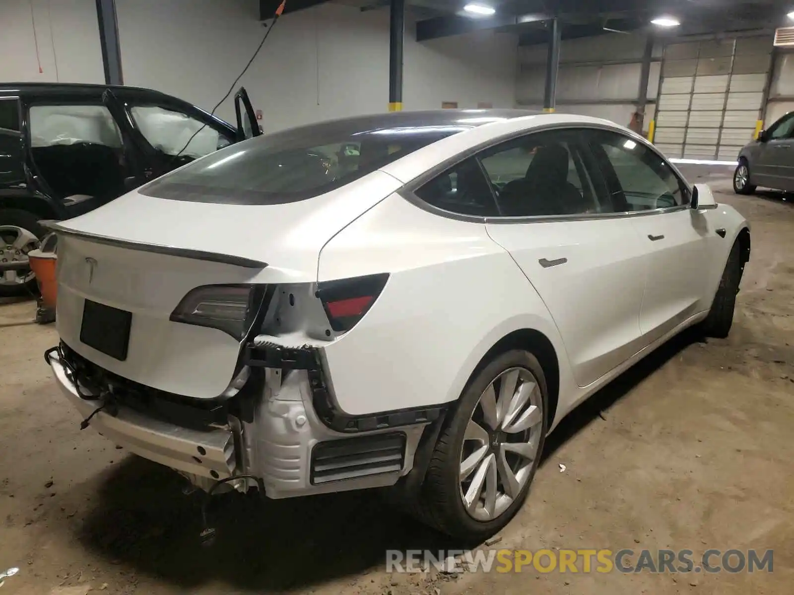 4 Photograph of a damaged car 5YJ3E1EA9LF738021 TESLA MODEL 3 2020