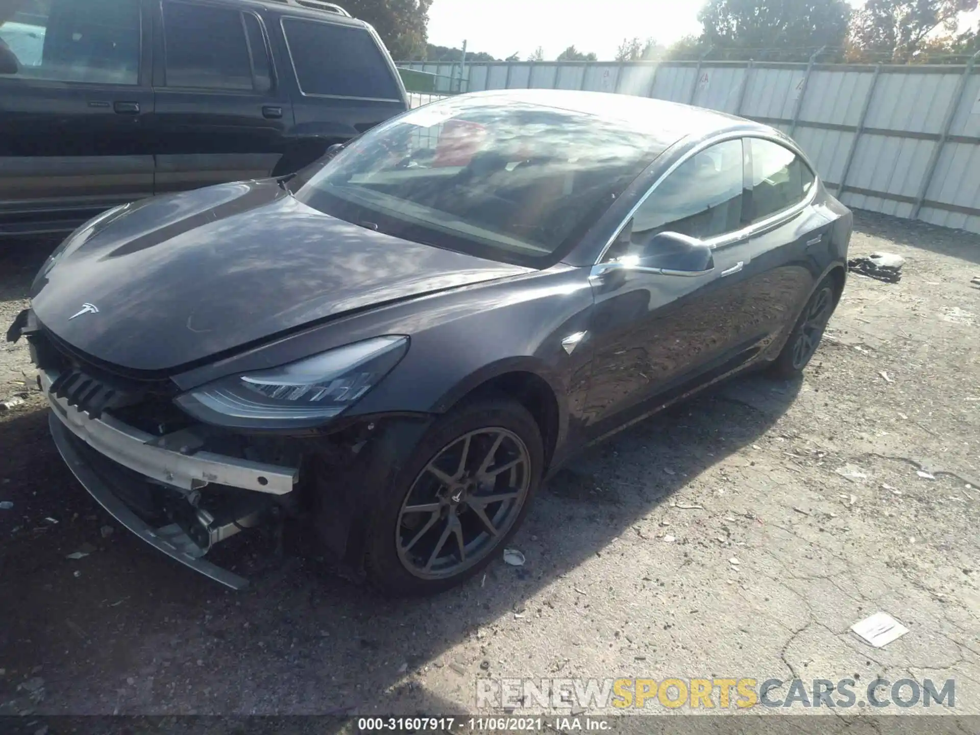 2 Photograph of a damaged car 5YJ3E1EA9LF739296 TESLA MODEL 3 2020