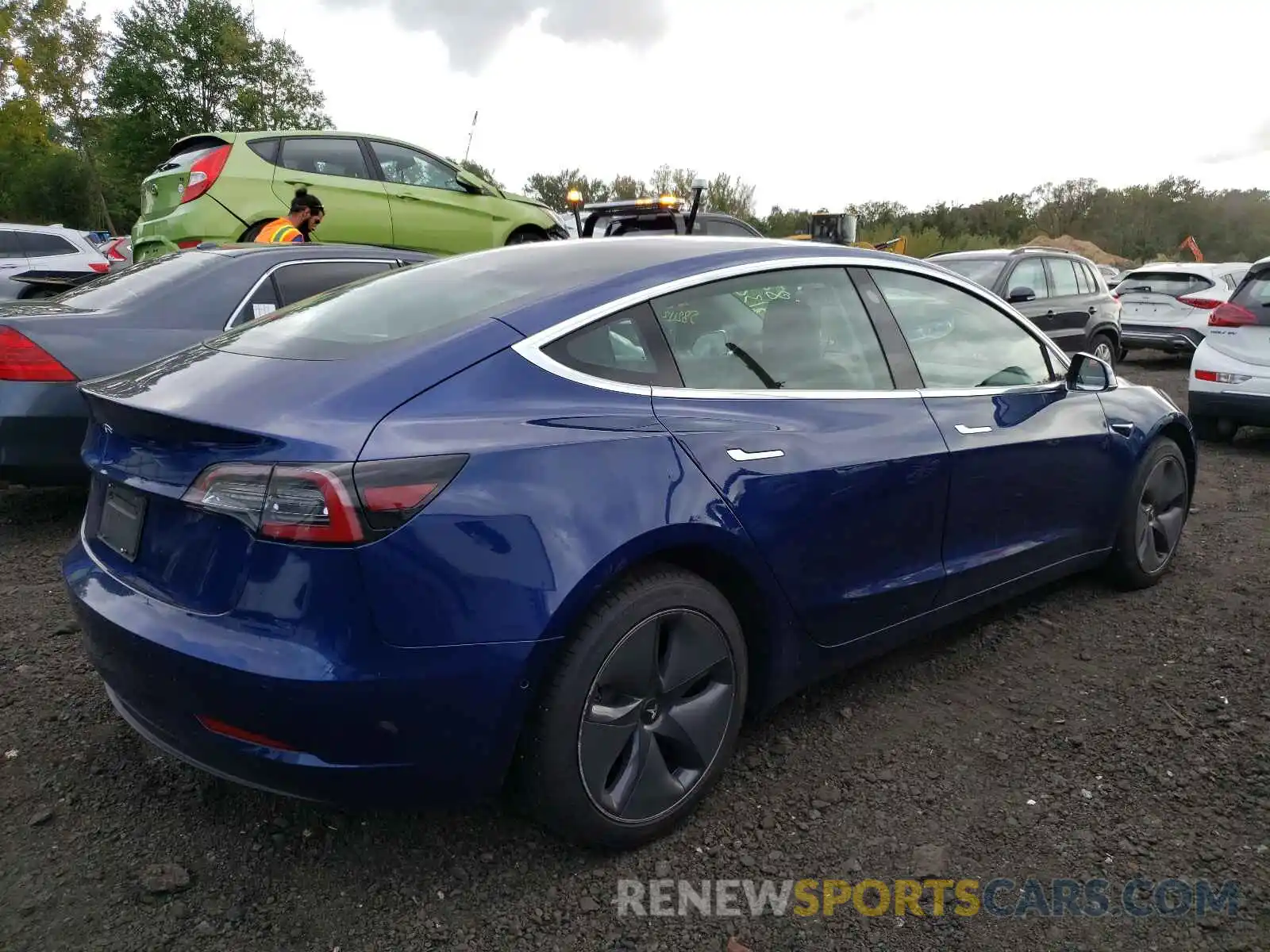 4 Photograph of a damaged car 5YJ3E1EA9LF739847 TESLA MODEL 3 2020