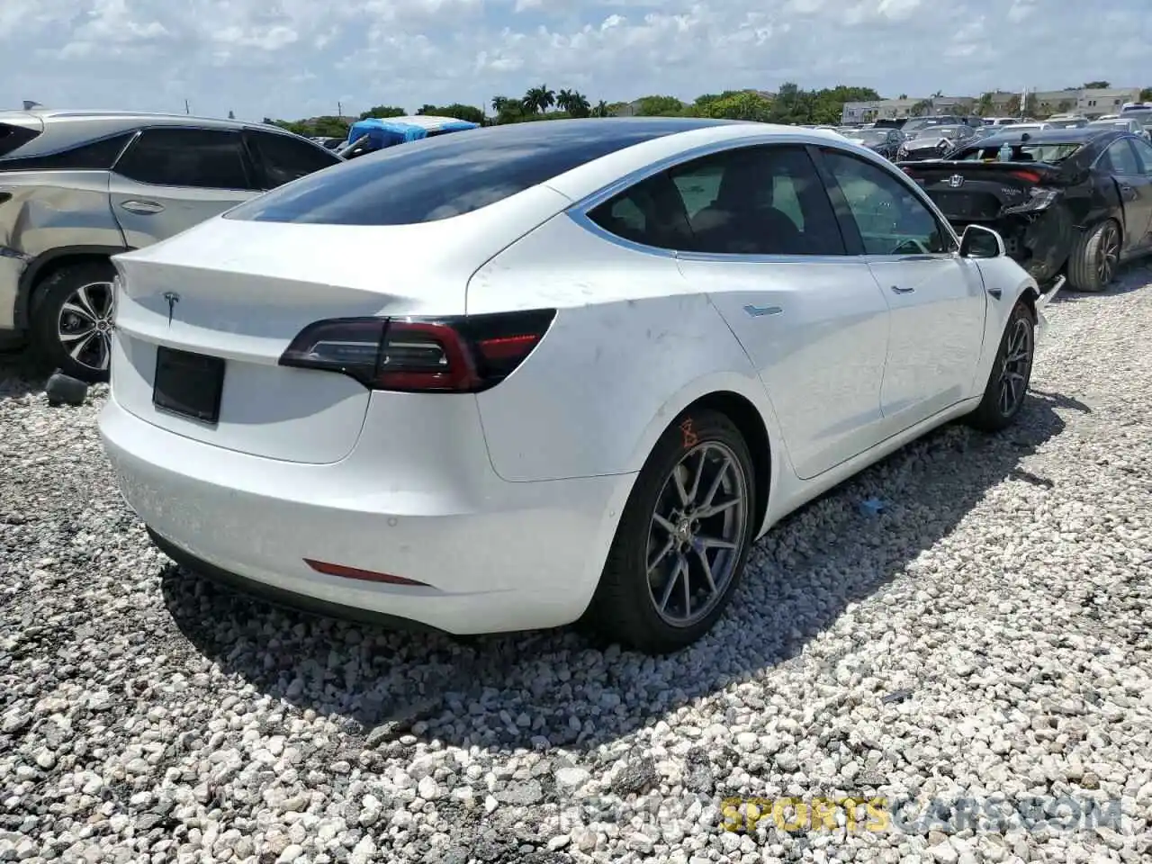 4 Photograph of a damaged car 5YJ3E1EA9LF792788 TESLA MODEL 3 2020