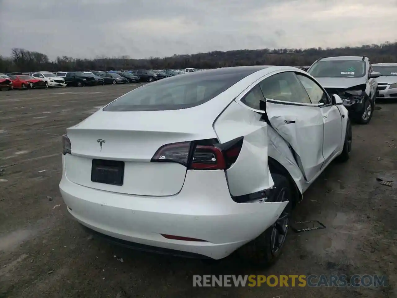 4 Photograph of a damaged car 5YJ3E1EA9LF797358 TESLA MODEL 3 2020