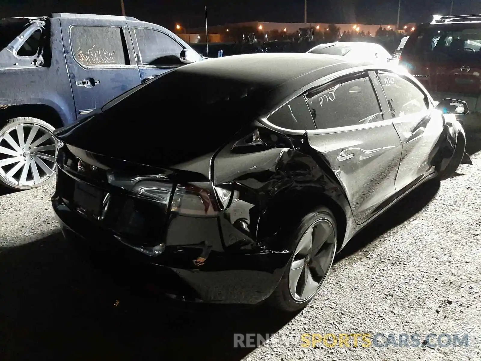 4 Photograph of a damaged car 5YJ3E1EA9LF798834 TESLA MODEL 3 2020