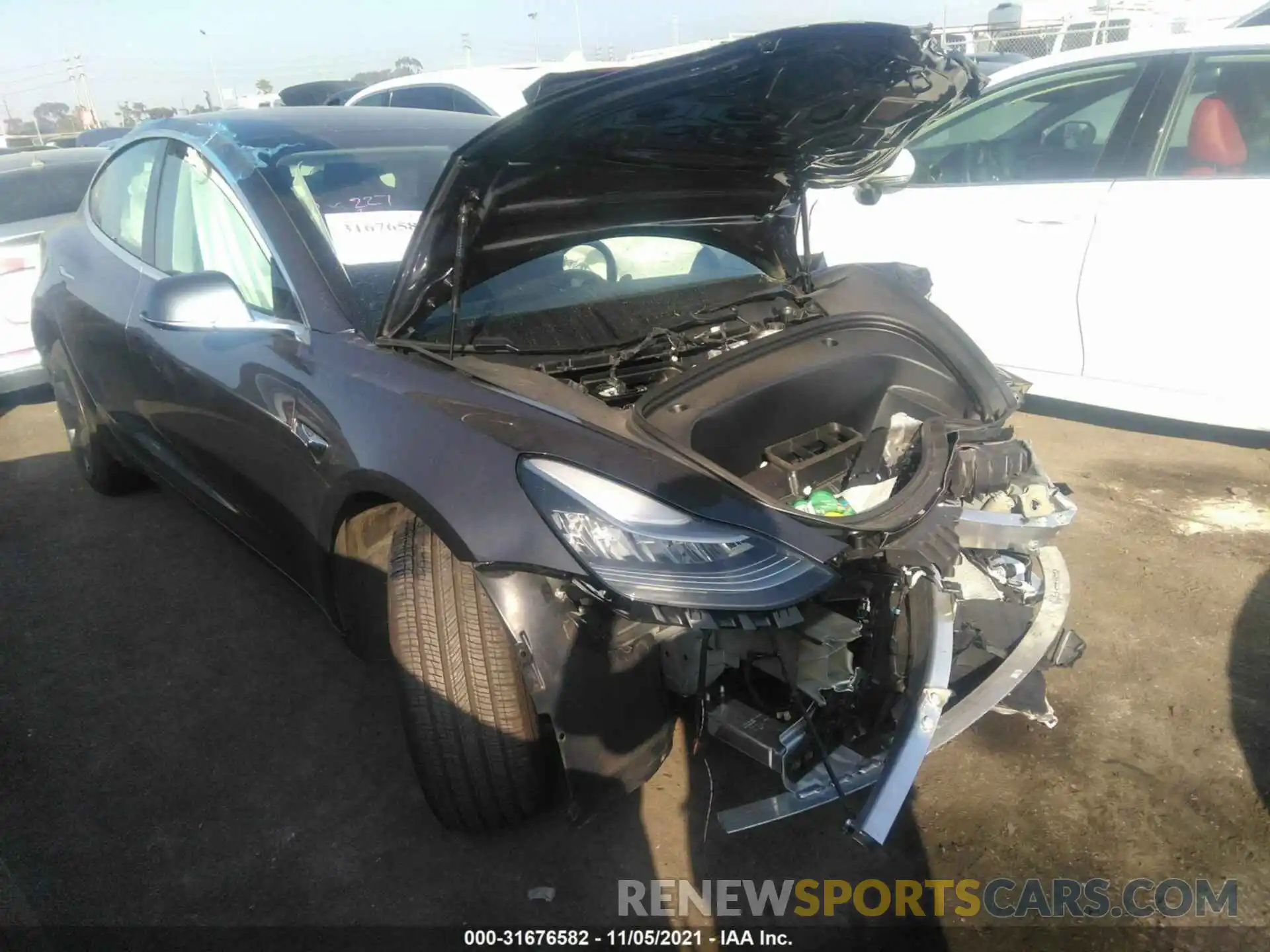 1 Photograph of a damaged car 5YJ3E1EA9LF803577 TESLA MODEL 3 2020