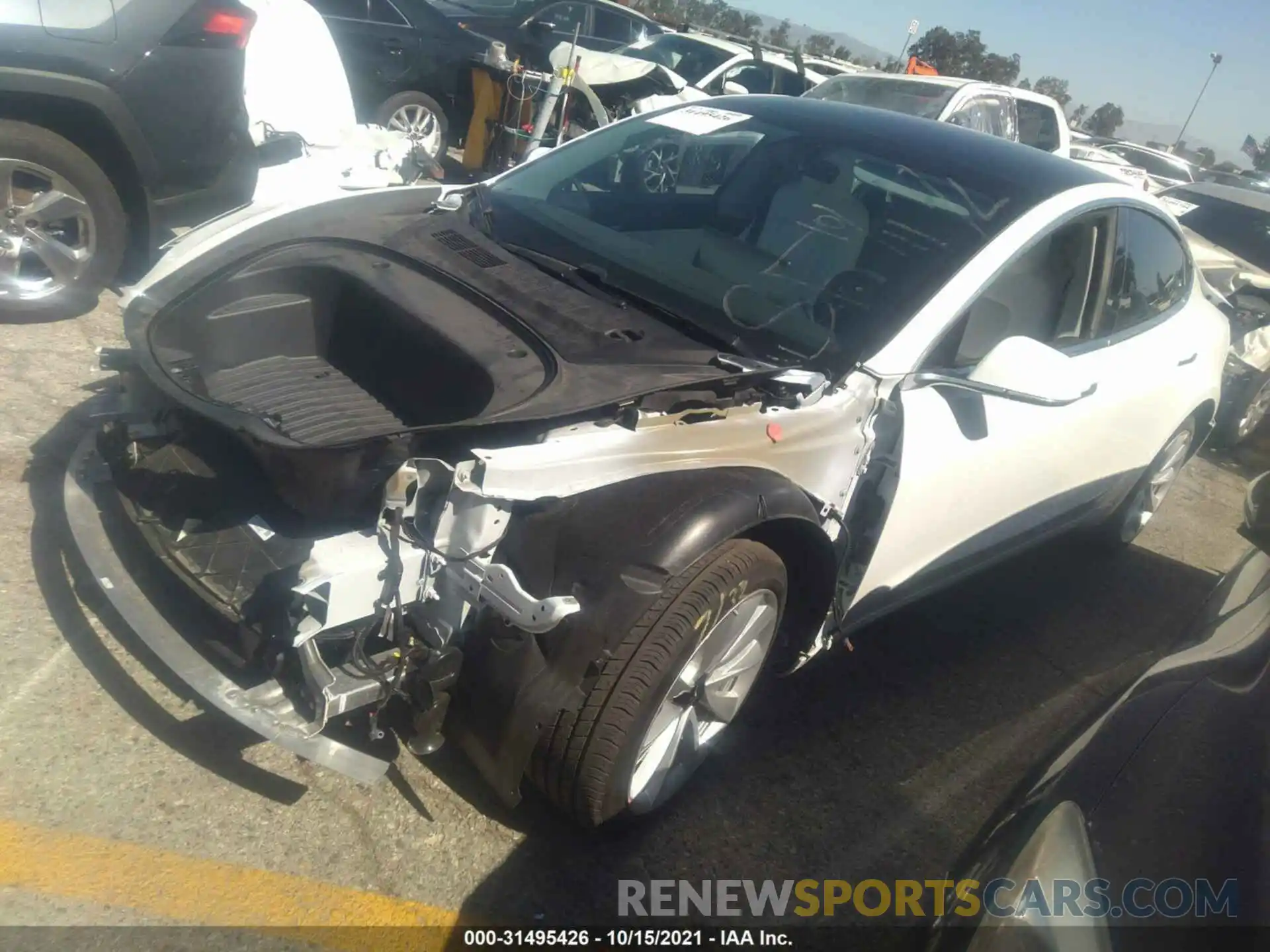 2 Photograph of a damaged car 5YJ3E1EA9LF806897 TESLA MODEL 3 2020