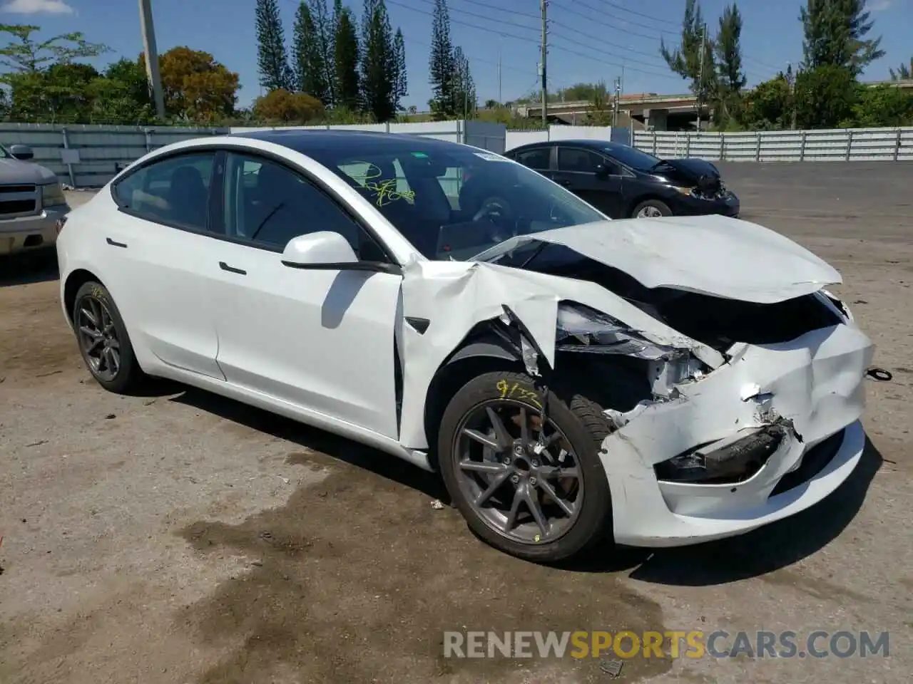 4 Photograph of a damaged car 5YJ3E1EAXLF504261 TESLA MODEL 3 2020