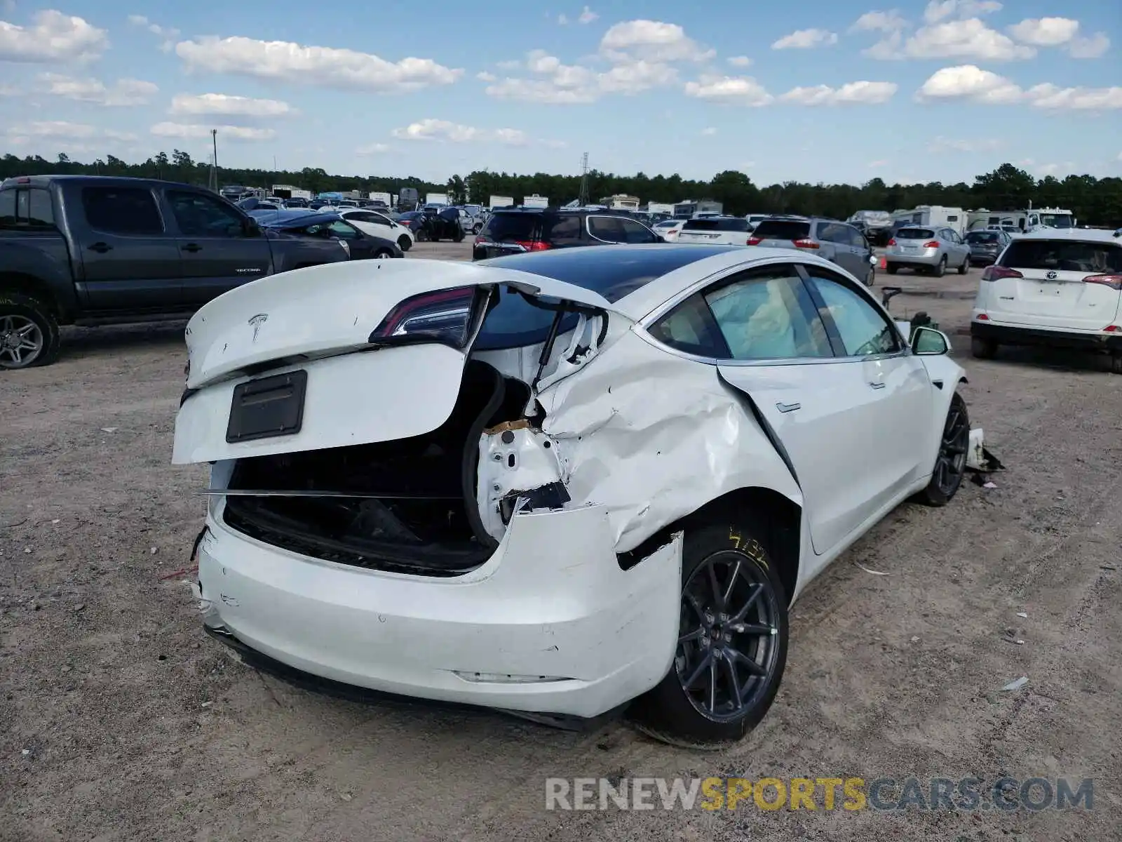 4 Photograph of a damaged car 5YJ3E1EAXLF504602 TESLA MODEL 3 2020