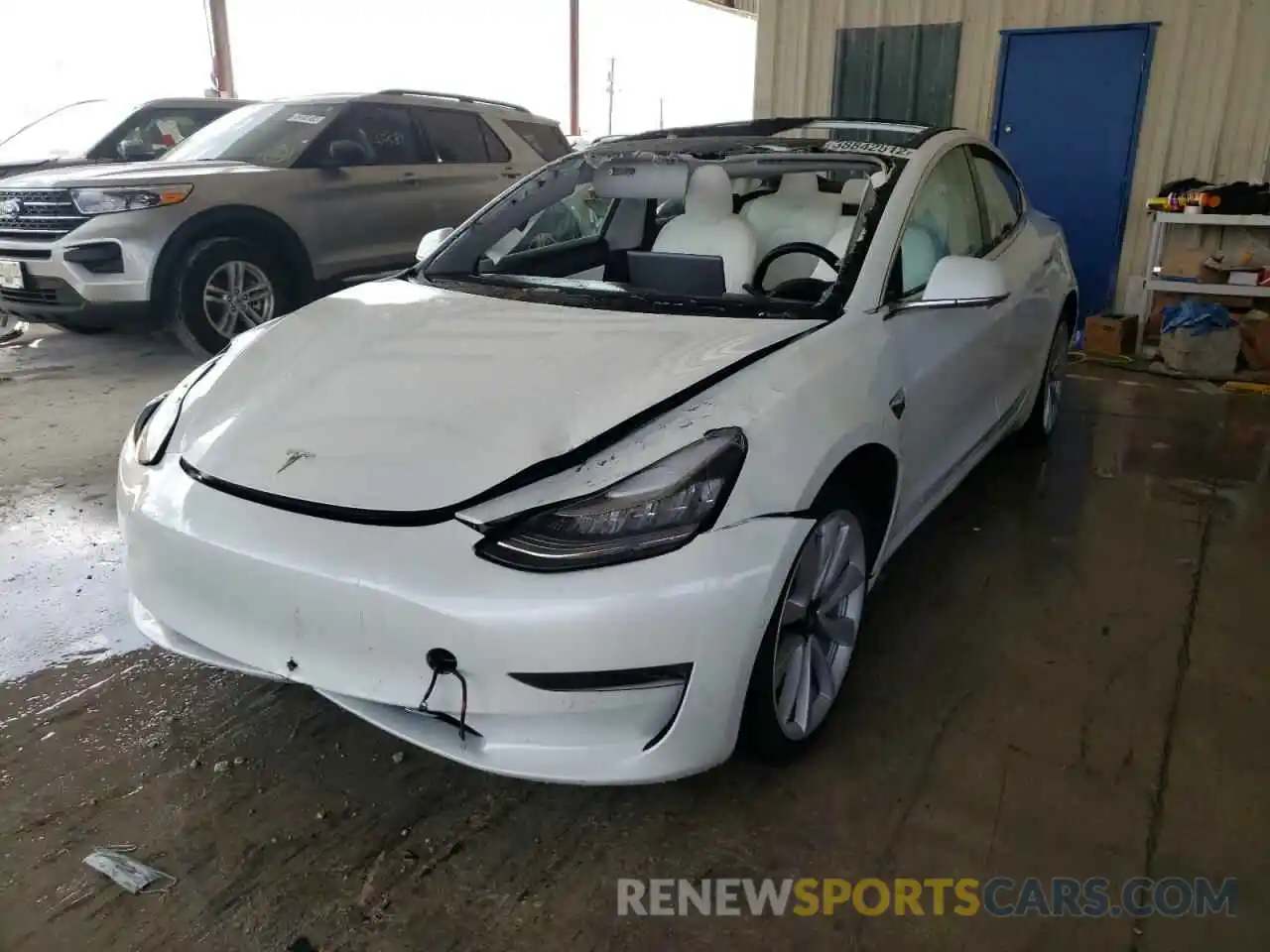 2 Photograph of a damaged car 5YJ3E1EAXLF509931 TESLA MODEL 3 2020