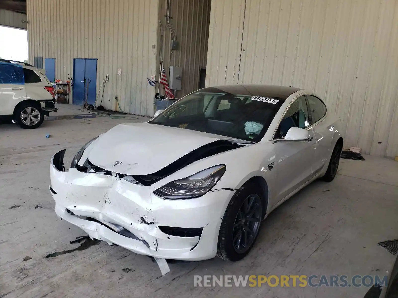 2 Photograph of a damaged car 5YJ3E1EAXLF598092 TESLA MODEL 3 2020