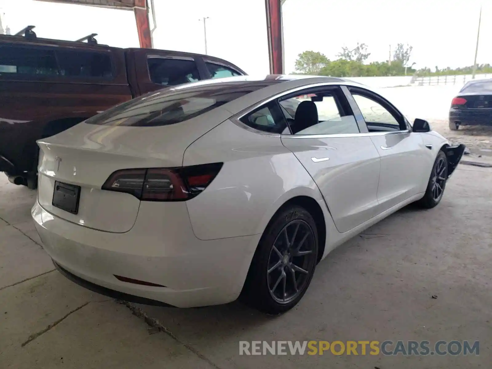 4 Photograph of a damaged car 5YJ3E1EAXLF598092 TESLA MODEL 3 2020