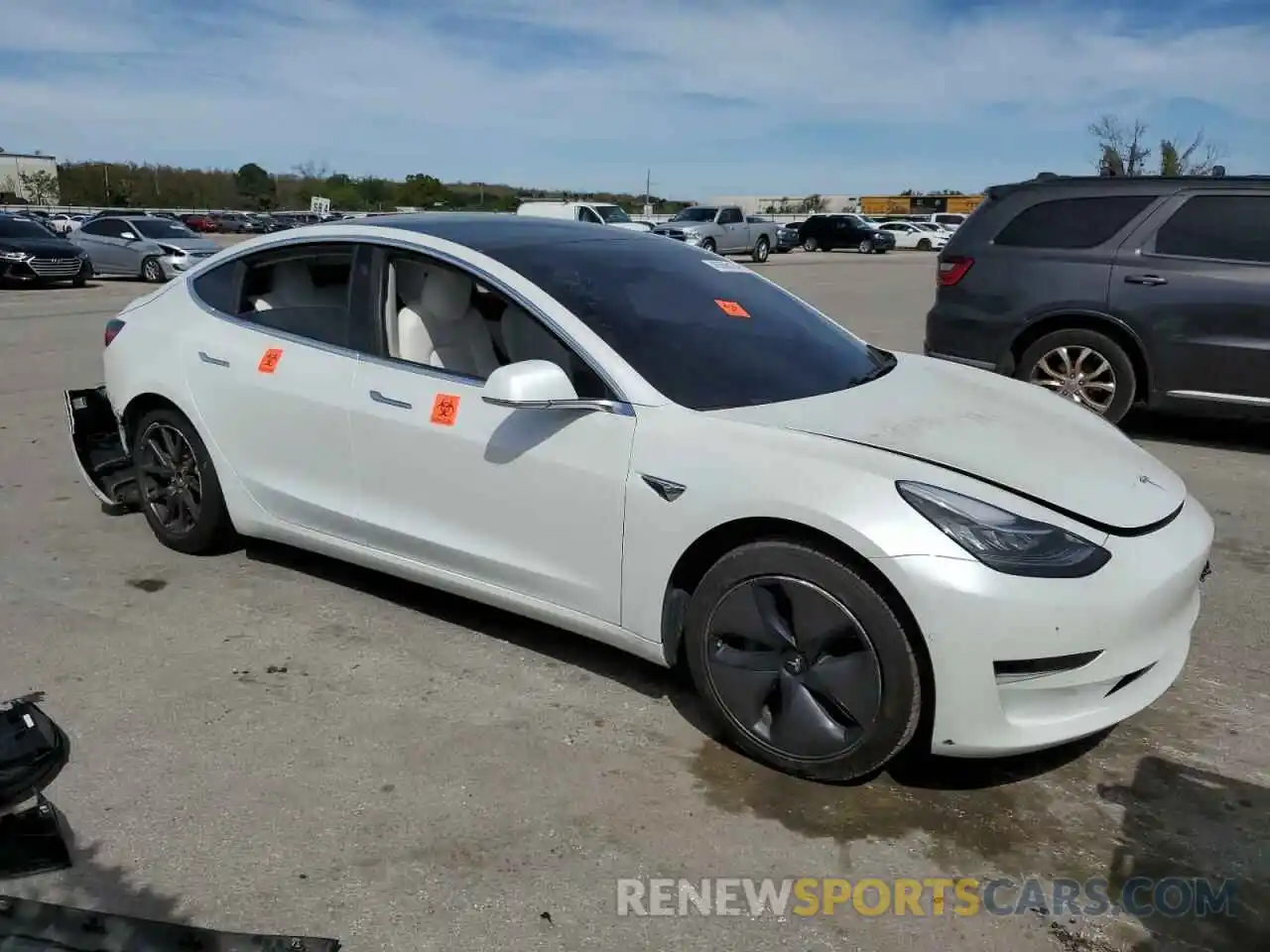 4 Photograph of a damaged car 5YJ3E1EAXLF599212 TESLA MODEL 3 2020