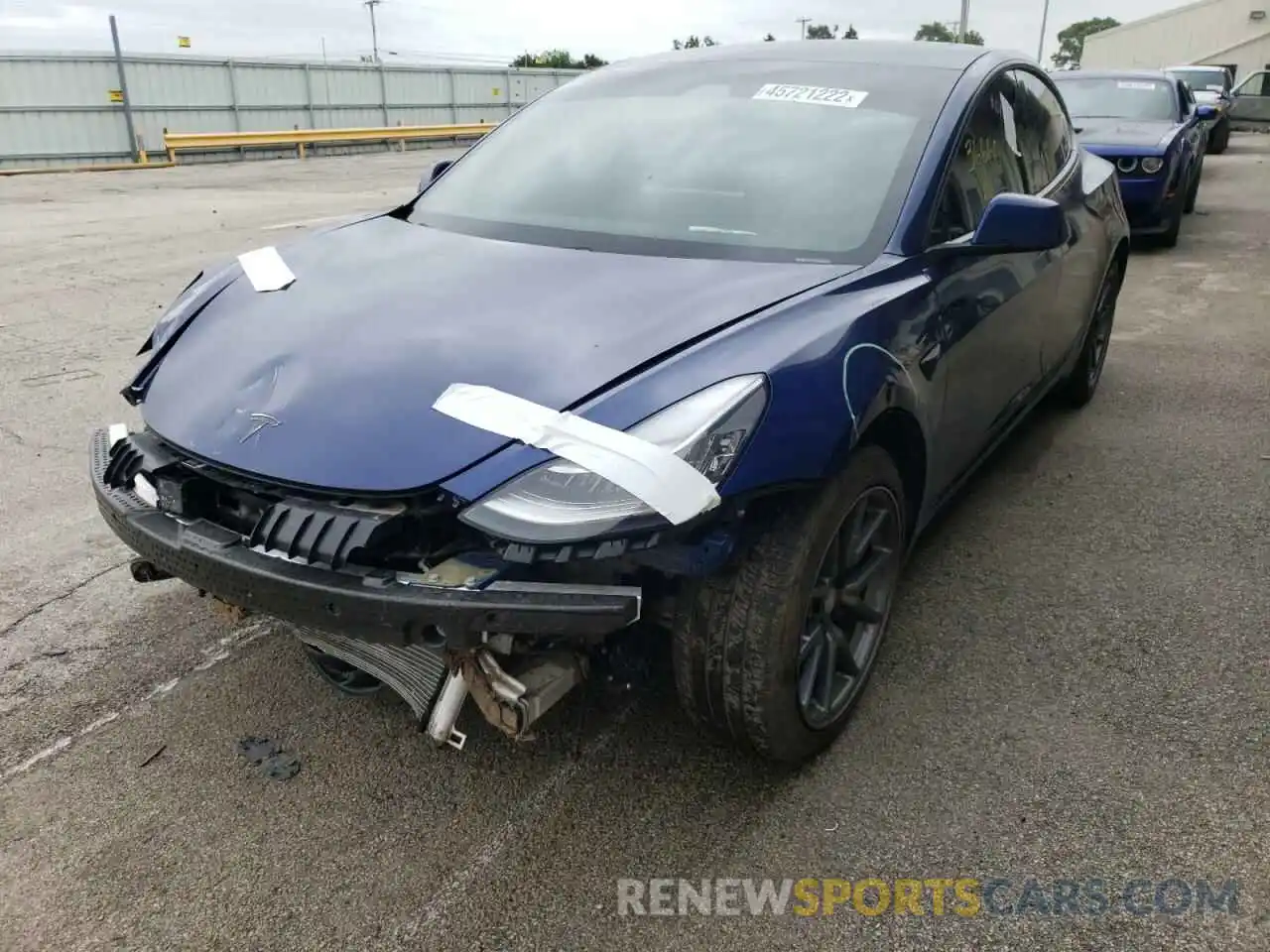 2 Photograph of a damaged car 5YJ3E1EAXLF609303 TESLA MODEL 3 2020