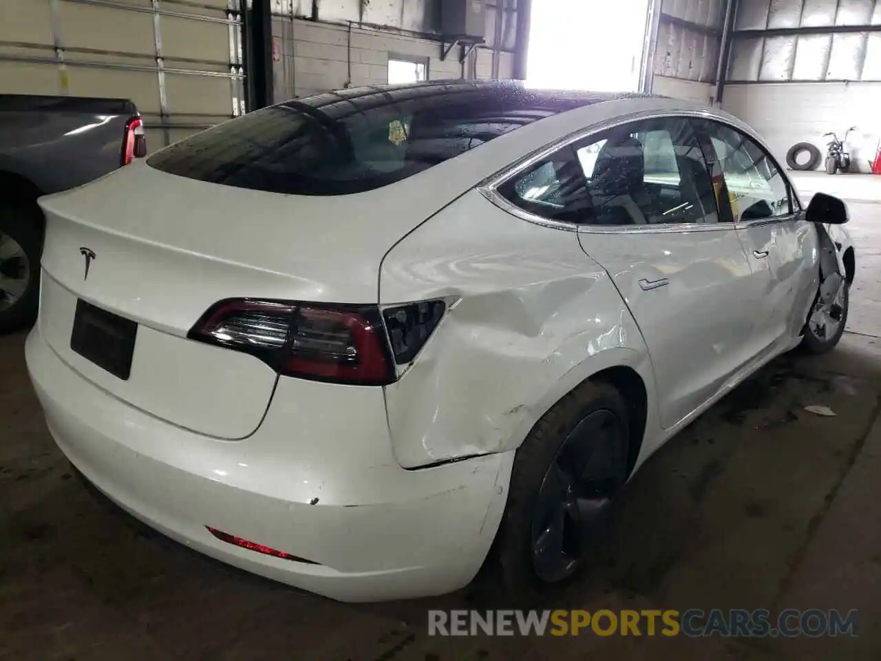 4 Photograph of a damaged car 5YJ3E1EAXLF612492 TESLA MODEL 3 2020