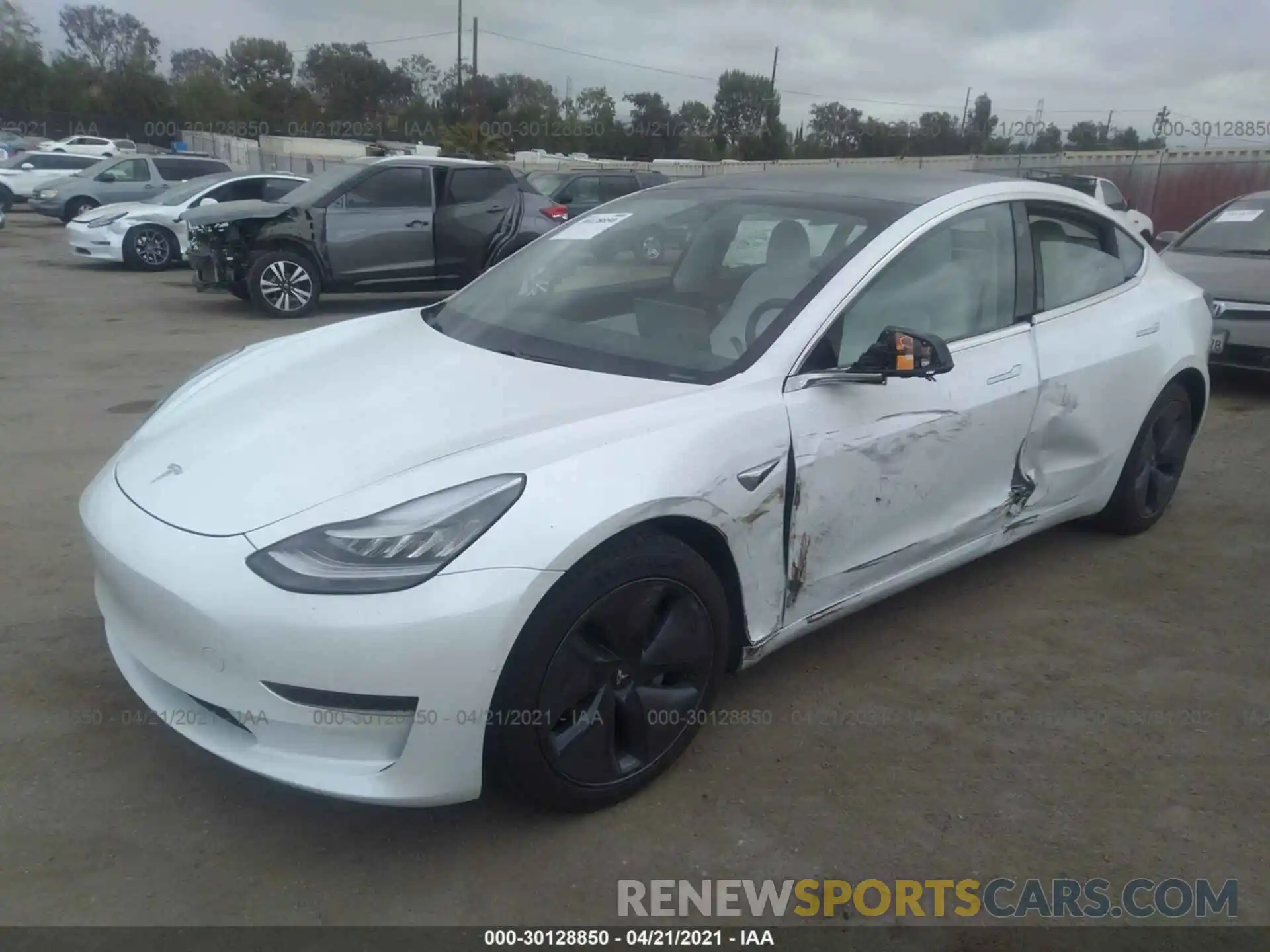 2 Photograph of a damaged car 5YJ3E1EAXLF615599 TESLA MODEL 3 2020