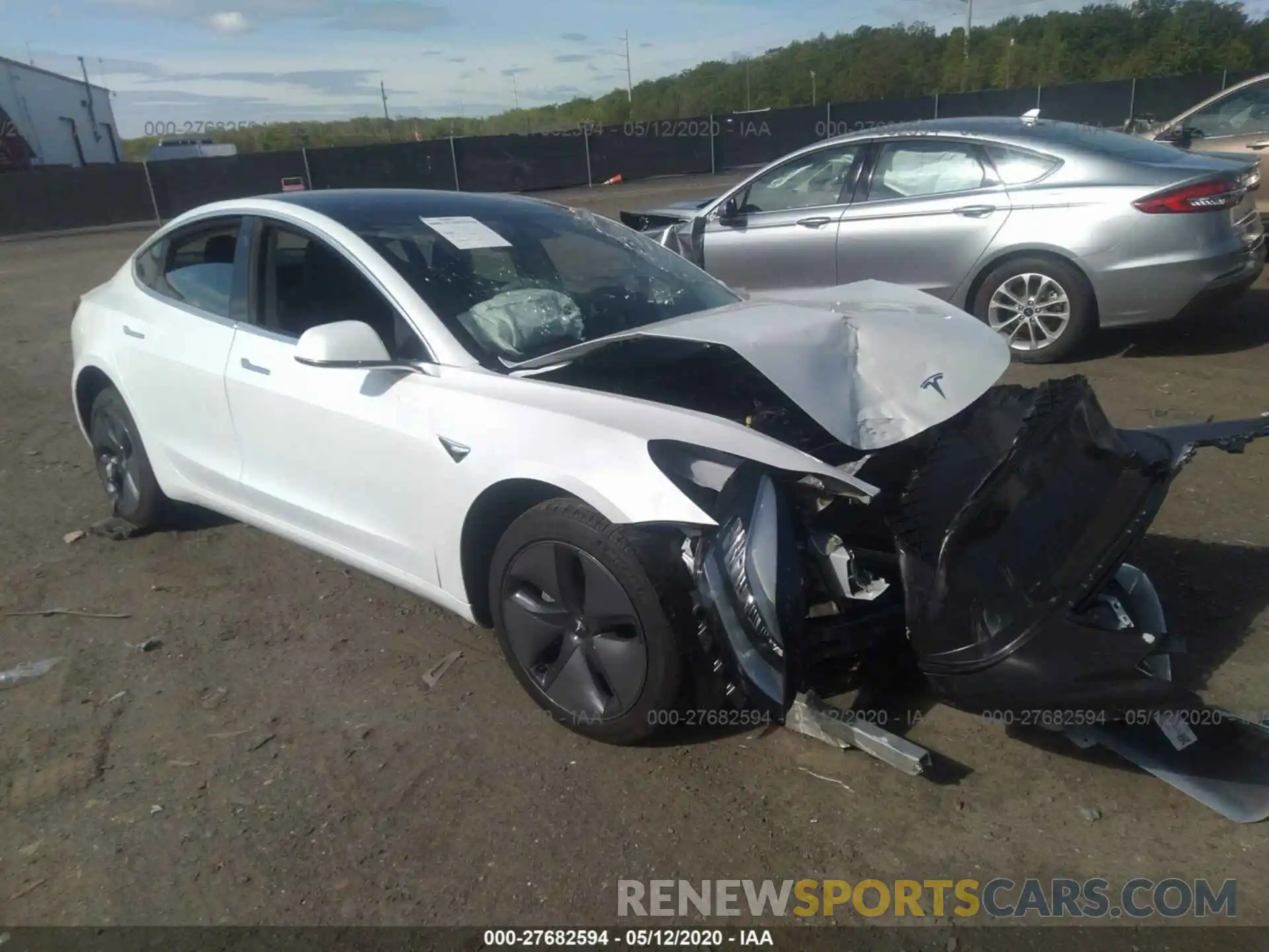 1 Photograph of a damaged car 5YJ3E1EAXLF633018 TESLA MODEL 3 2020