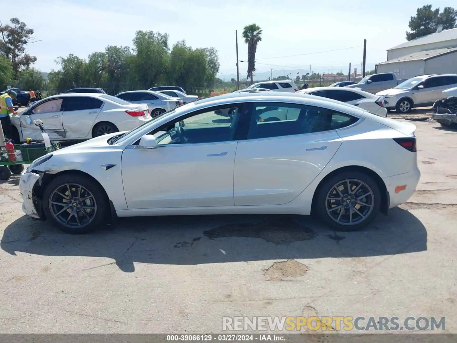 14 Photograph of a damaged car 5YJ3E1EAXLF633231 TESLA MODEL 3 2020