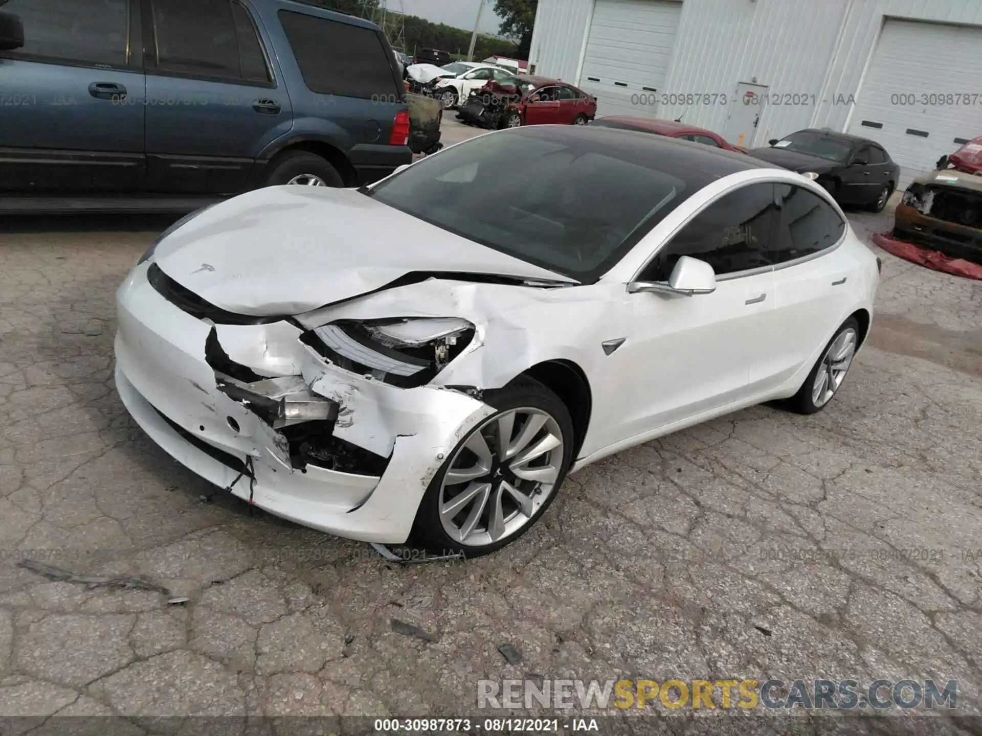 2 Photograph of a damaged car 5YJ3E1EAXLF661546 TESLA MODEL 3 2020