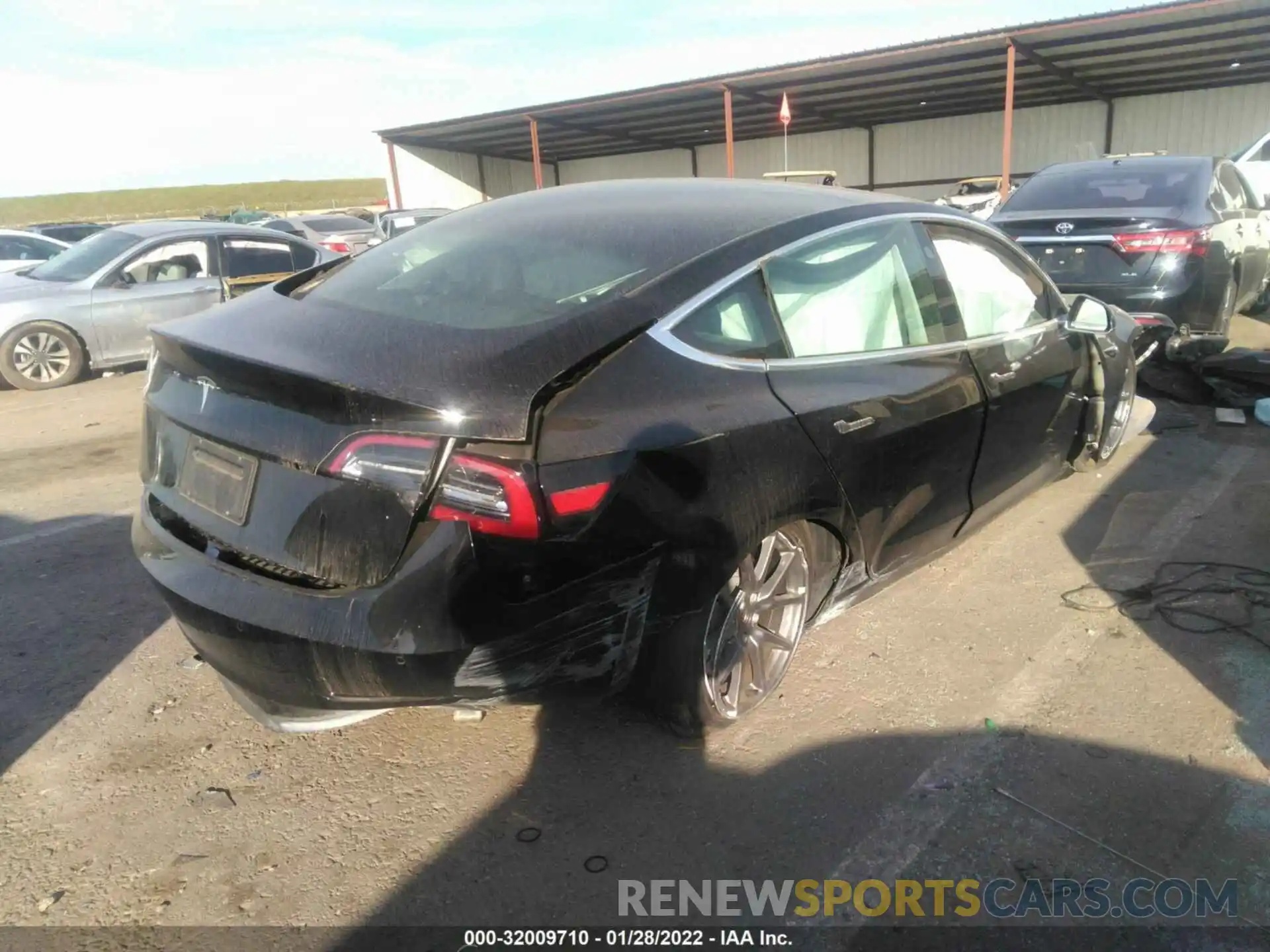 4 Photograph of a damaged car 5YJ3E1EAXLF704508 TESLA MODEL 3 2020