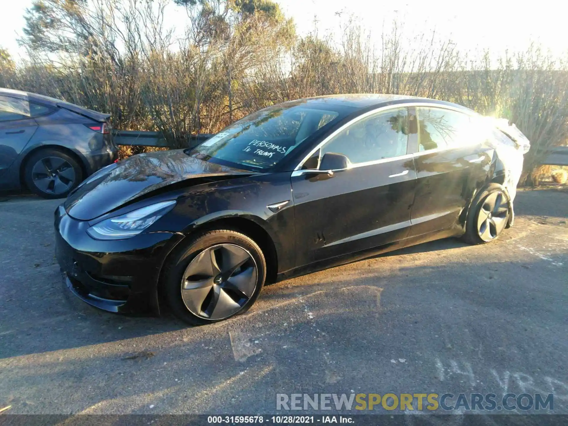 2 Photograph of a damaged car 5YJ3E1EAXLF704587 TESLA MODEL 3 2020