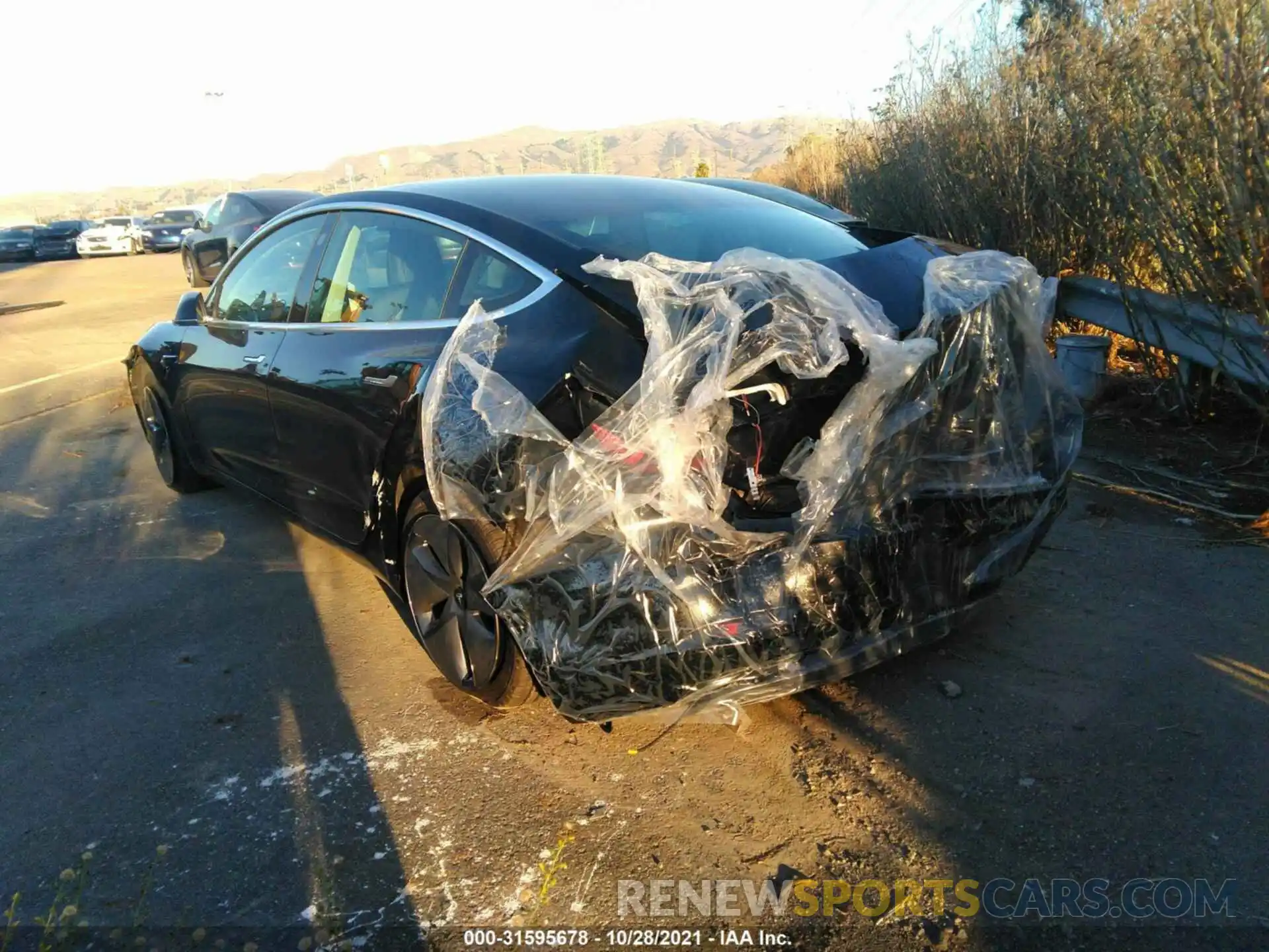 3 Photograph of a damaged car 5YJ3E1EAXLF704587 TESLA MODEL 3 2020