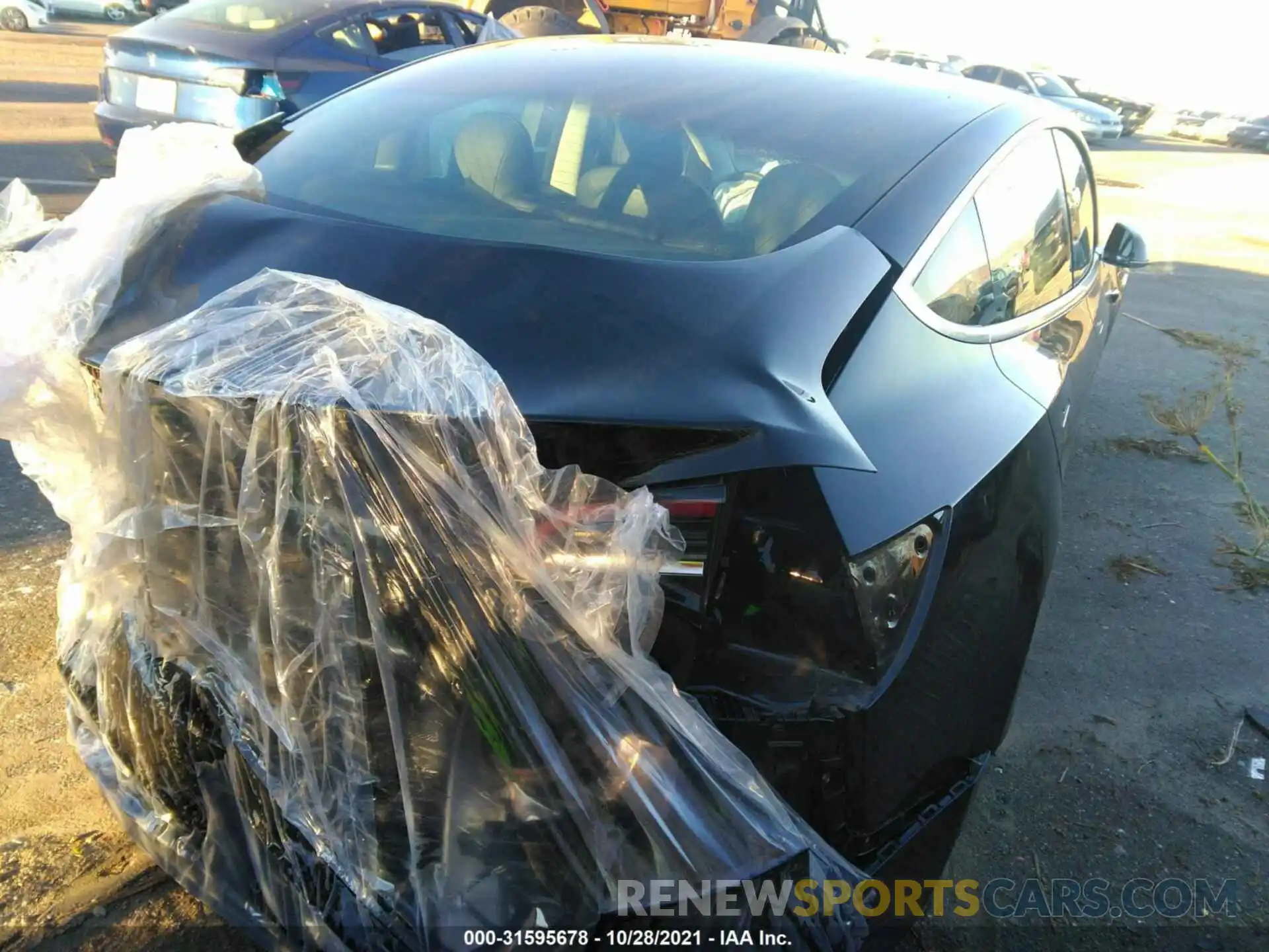 4 Photograph of a damaged car 5YJ3E1EAXLF704587 TESLA MODEL 3 2020