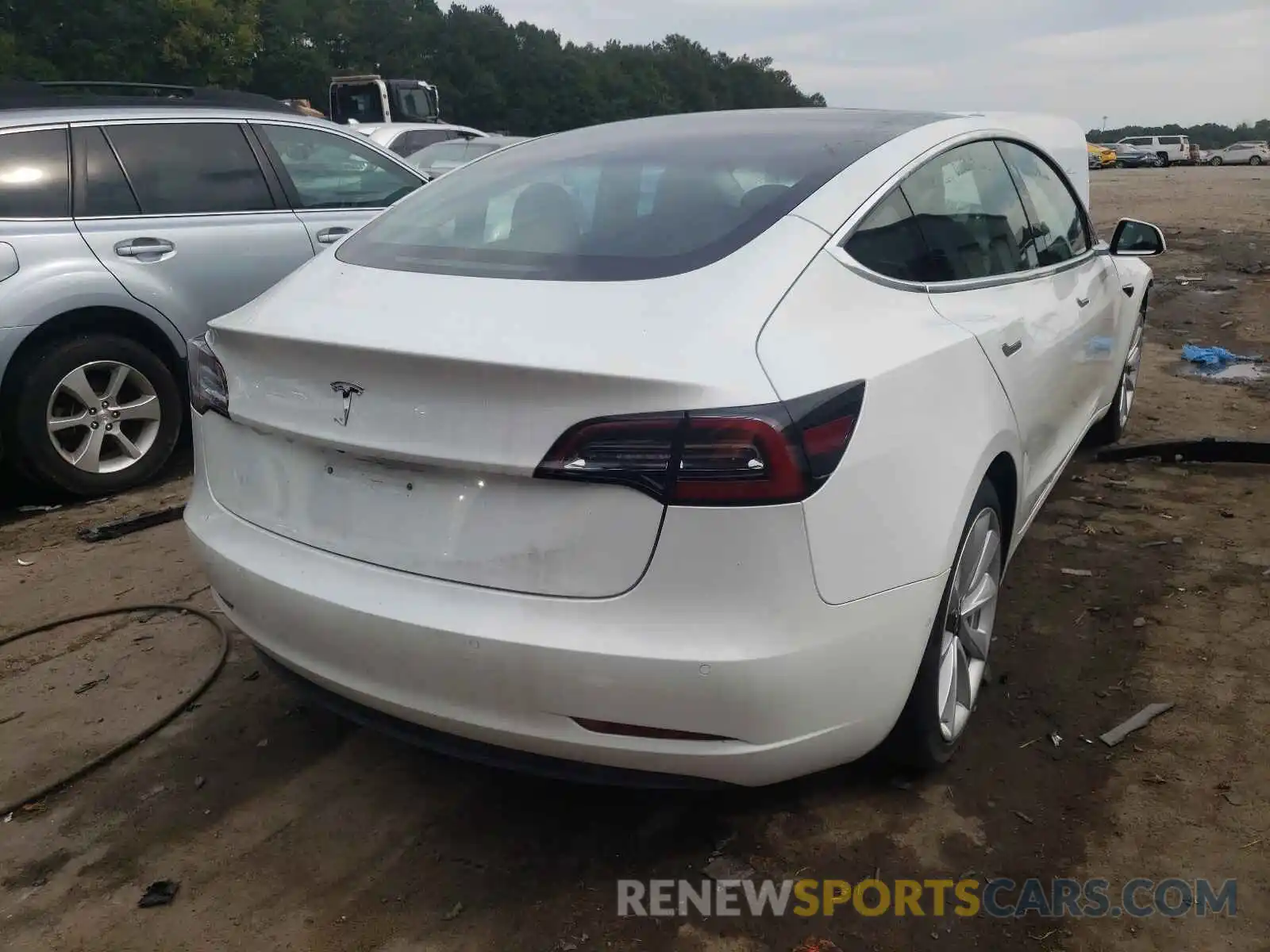 4 Photograph of a damaged car 5YJ3E1EAXLF709241 TESLA MODEL 3 2020