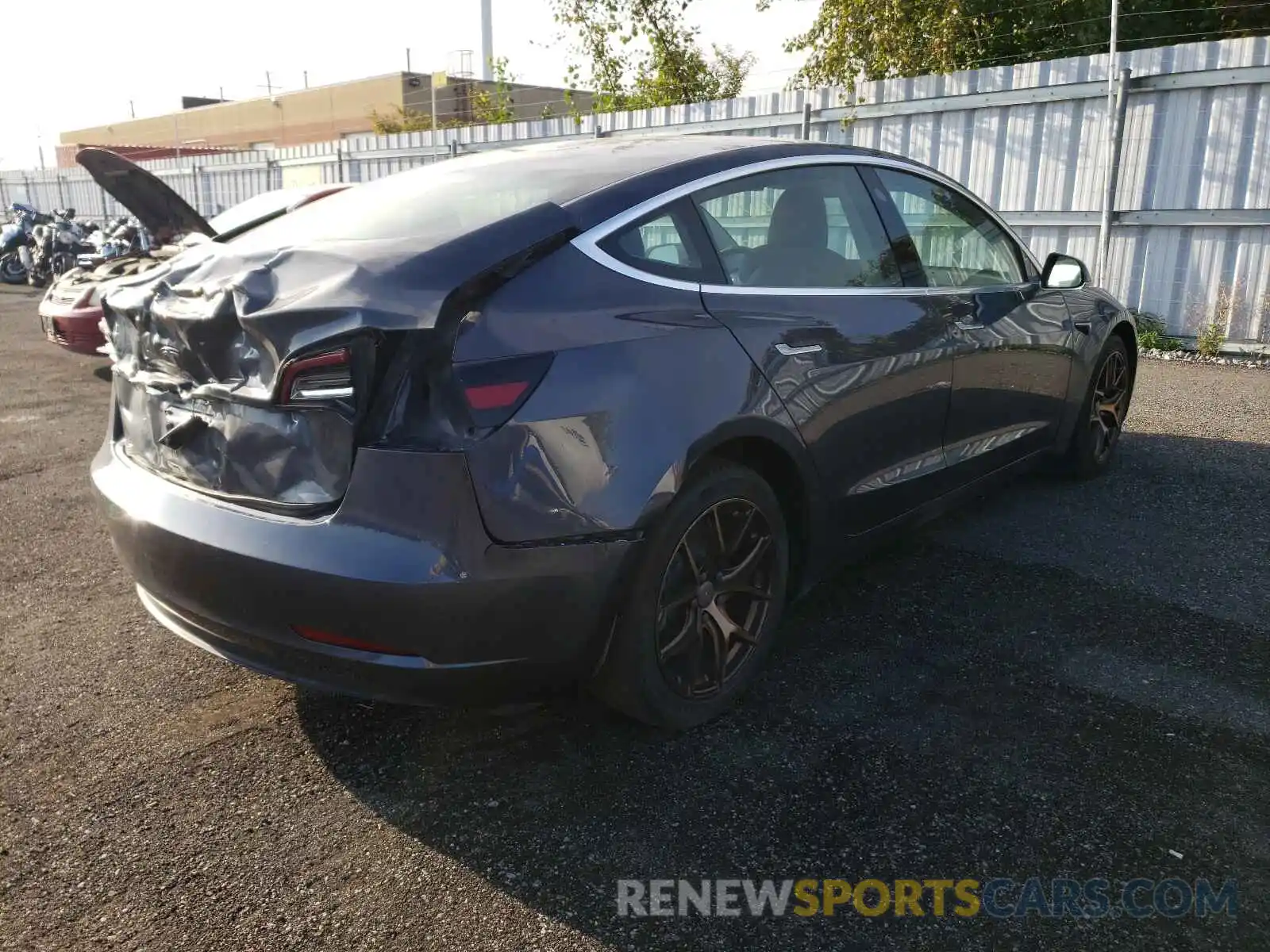 4 Photograph of a damaged car 5YJ3E1EAXLF733779 TESLA MODEL 3 2020