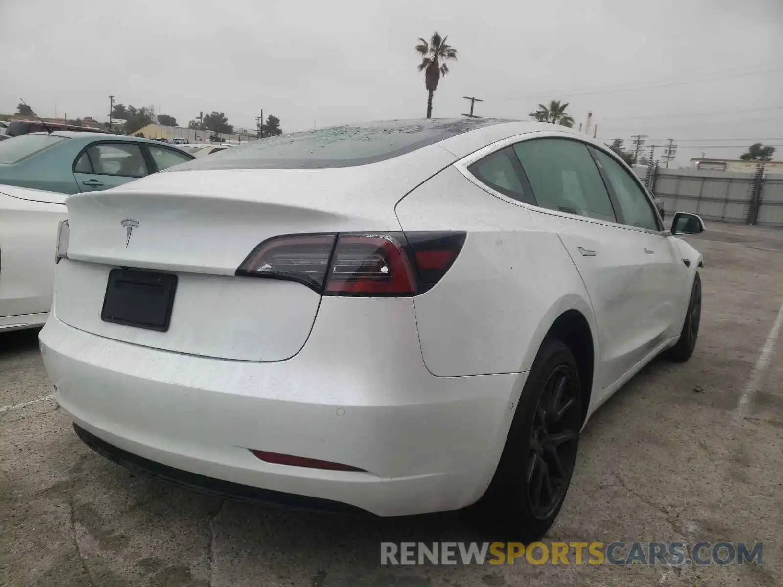 4 Photograph of a damaged car 5YJ3E1EAXLF745205 TESLA MODEL 3 2020