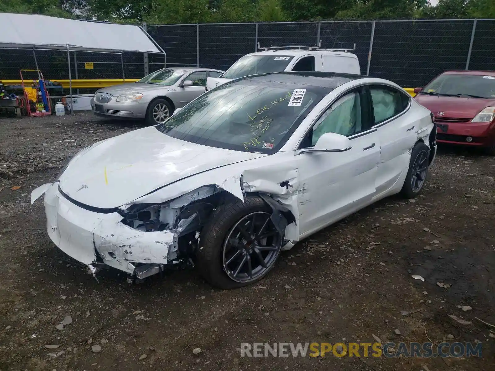 2 Photograph of a damaged car 5YJ3E1EAXLF792539 TESLA MODEL 3 2020