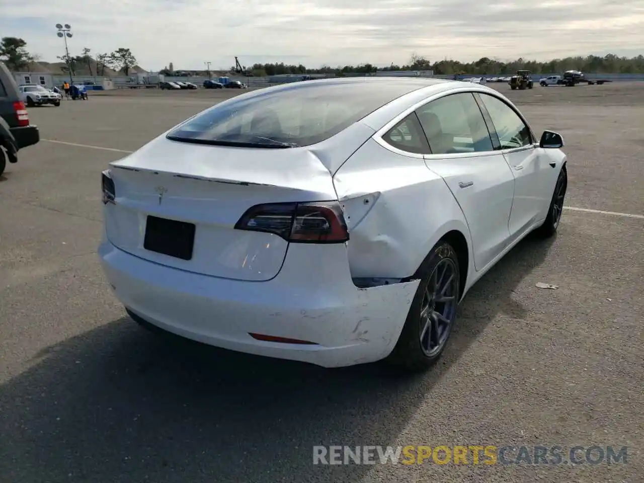 4 Photograph of a damaged car 5YJ3E1EAXLF797272 TESLA MODEL 3 2020