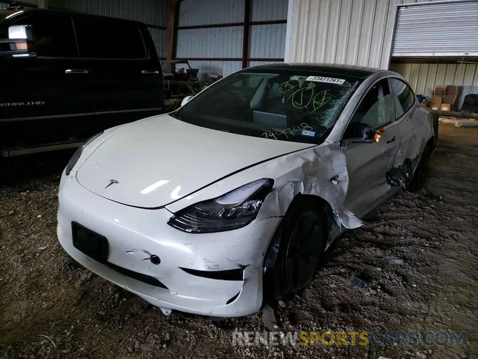 2 Photograph of a damaged car 5YJ3E1EAXLF799748 TESLA MODEL 3 2020