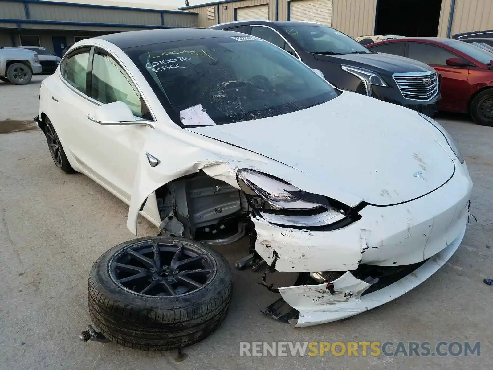 1 Photograph of a damaged car 5YJ3E1EAXLF799779 TESLA MODEL 3 2020