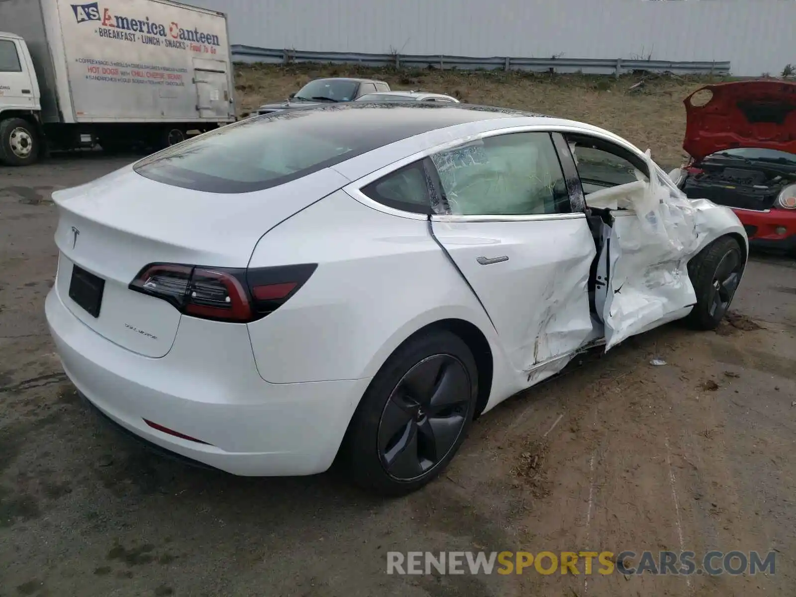 4 Photograph of a damaged car 5YJ3E1EB0LF606998 TESLA MODEL 3 2020