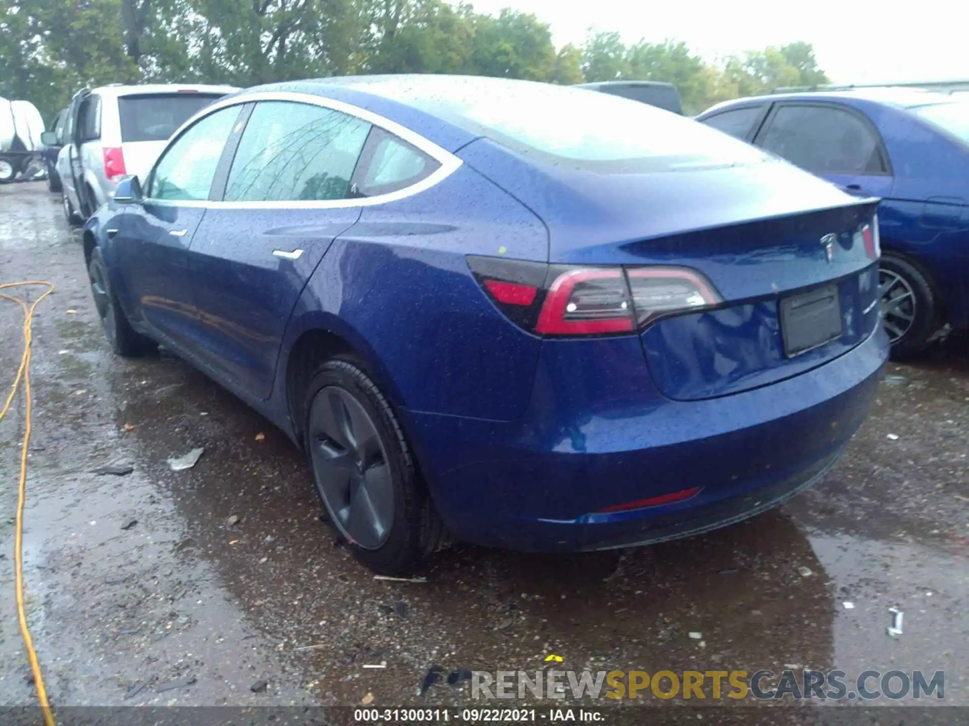 3 Photograph of a damaged car 5YJ3E1EB0LF617256 TESLA MODEL 3 2020