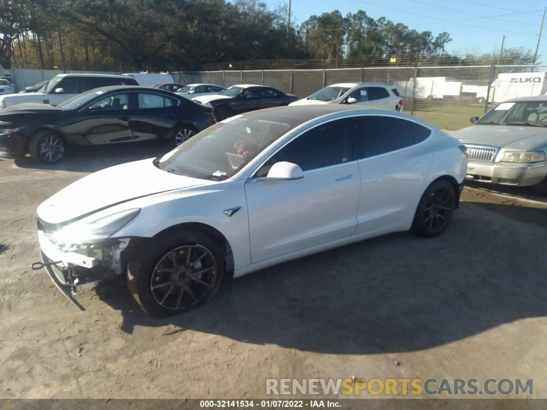 2 Photograph of a damaged car 5YJ3E1EB0LF617998 TESLA MODEL 3 2020