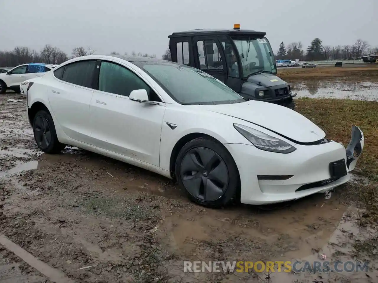 4 Photograph of a damaged car 5YJ3E1EB0LF618116 TESLA MODEL 3 2020