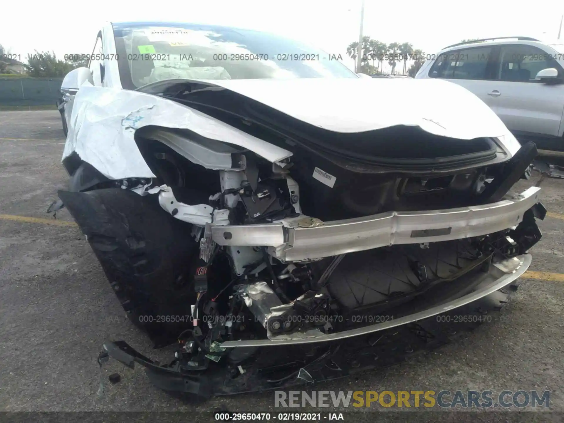 6 Photograph of a damaged car 5YJ3E1EB0LF639497 TESLA MODEL 3 2020