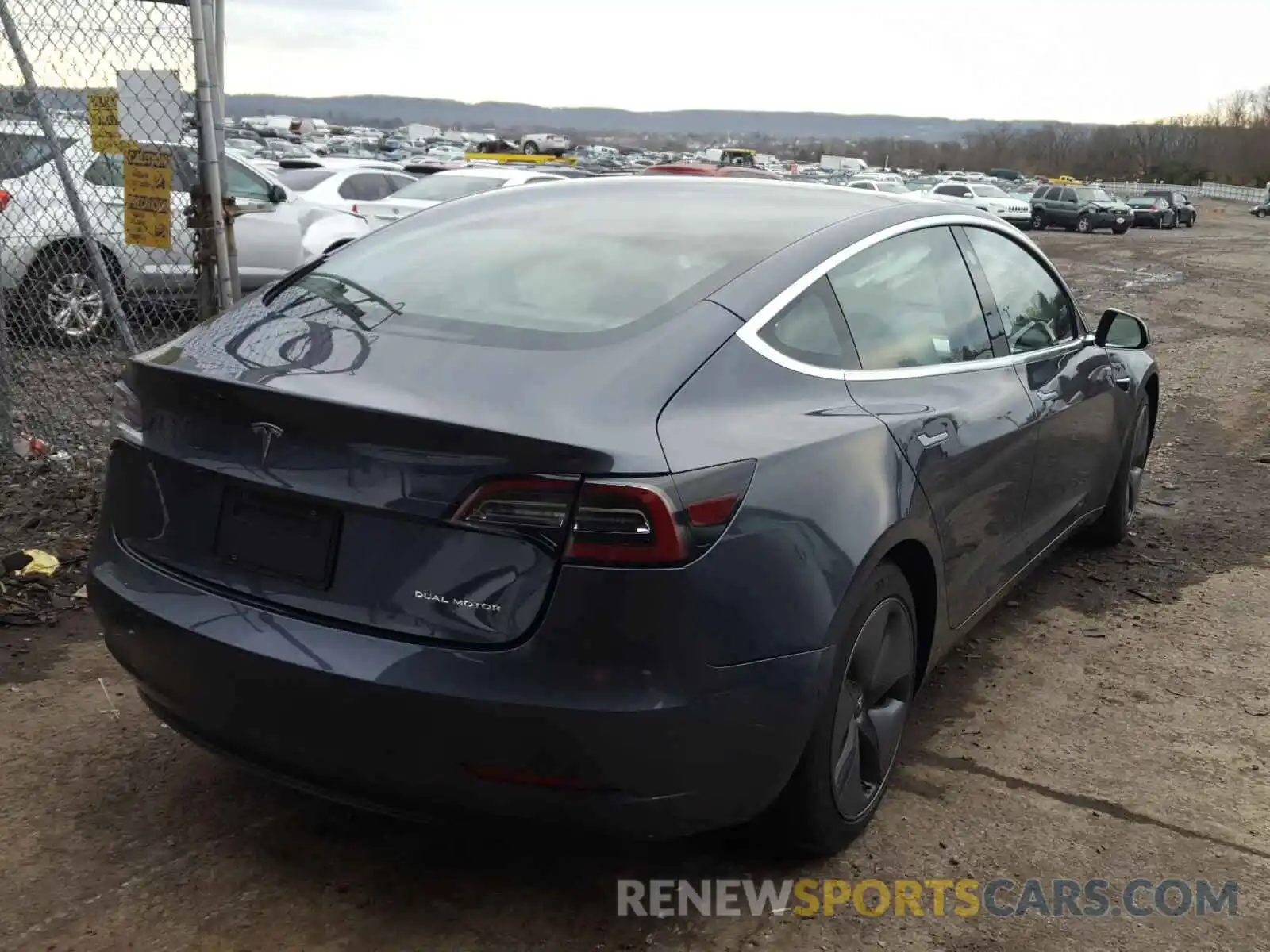 4 Photograph of a damaged car 5YJ3E1EB0LF639595 TESLA MODEL 3 2020