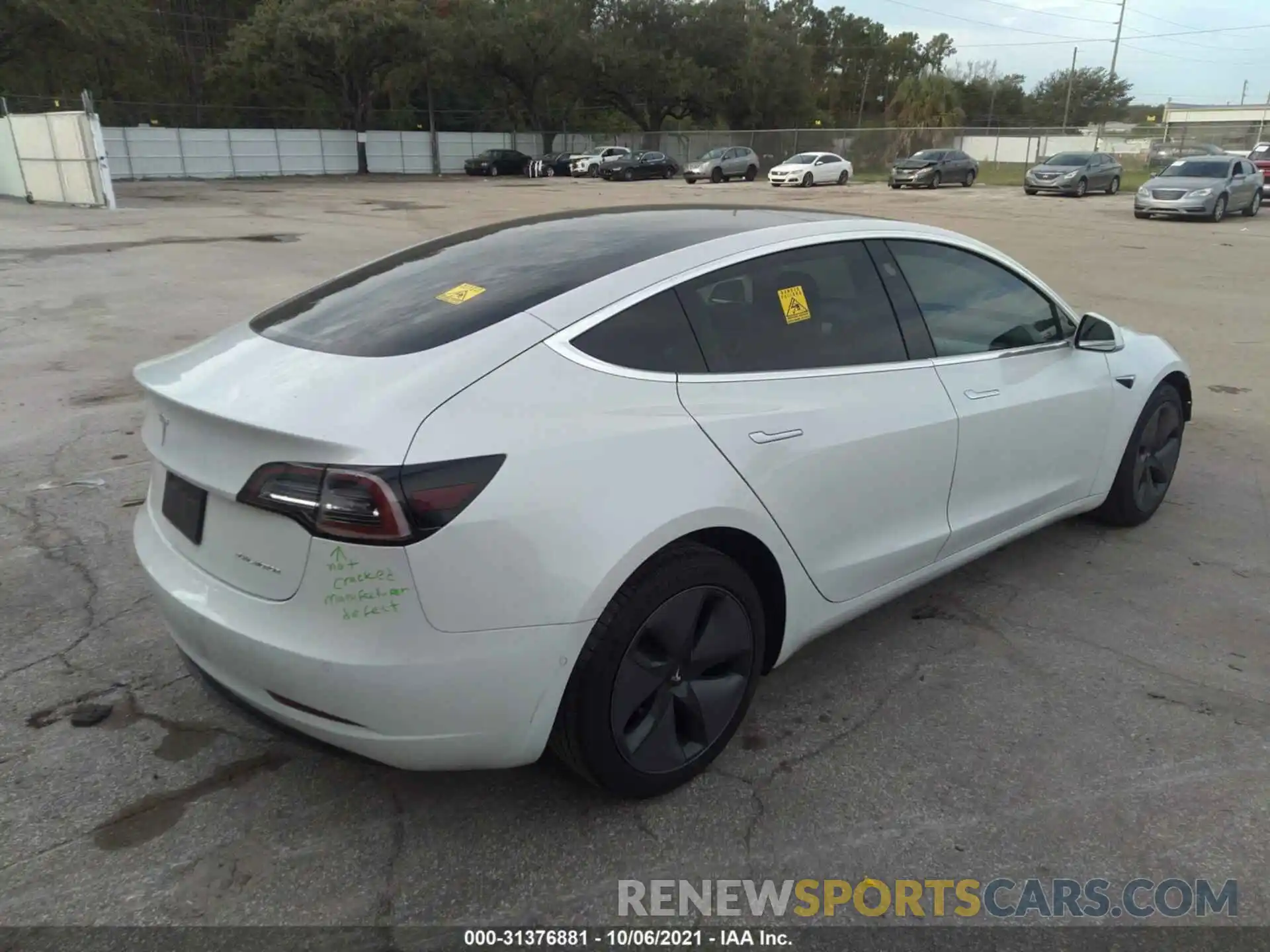 4 Photograph of a damaged car 5YJ3E1EB0LF639712 TESLA MODEL 3 2020