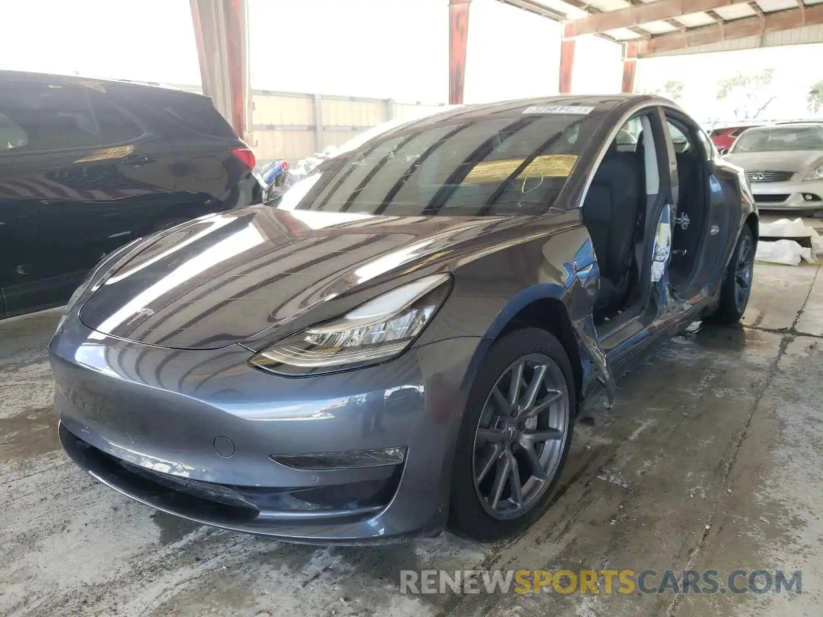 2 Photograph of a damaged car 5YJ3E1EB0LF649625 TESLA MODEL 3 2020