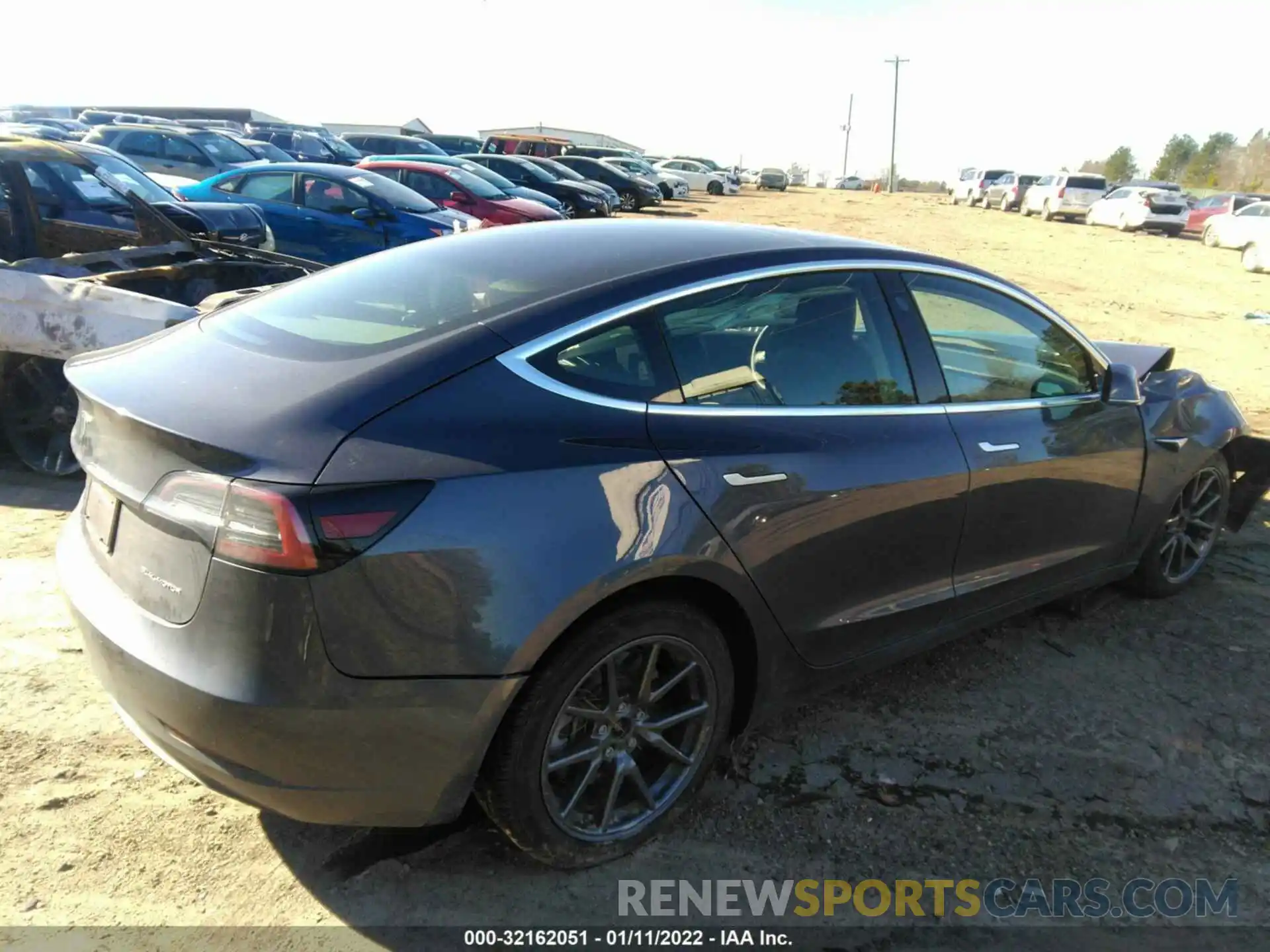 4 Photograph of a damaged car 5YJ3E1EB0LF663587 TESLA MODEL 3 2020