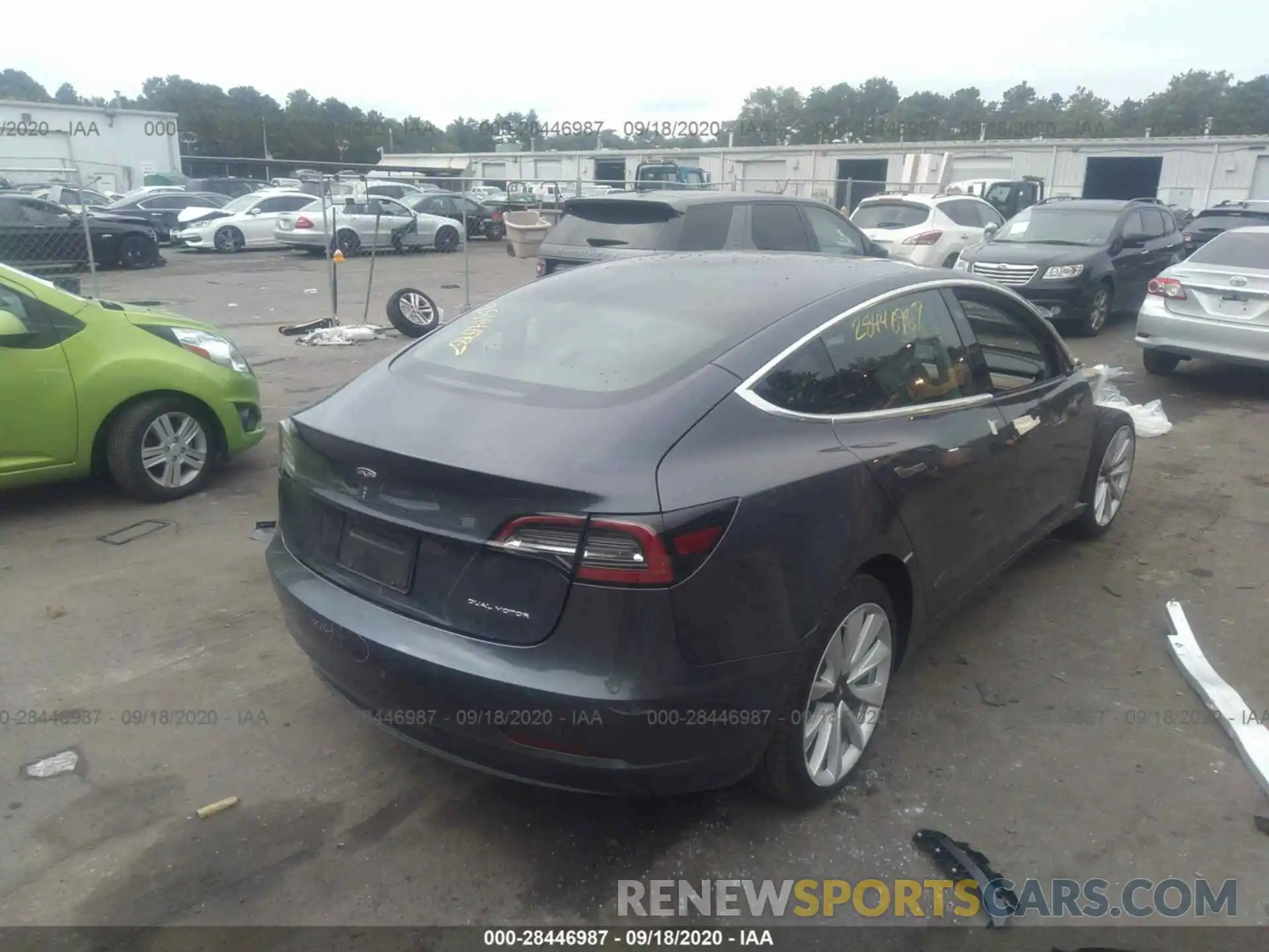 4 Photograph of a damaged car 5YJ3E1EB0LF666473 TESLA MODEL 3 2020