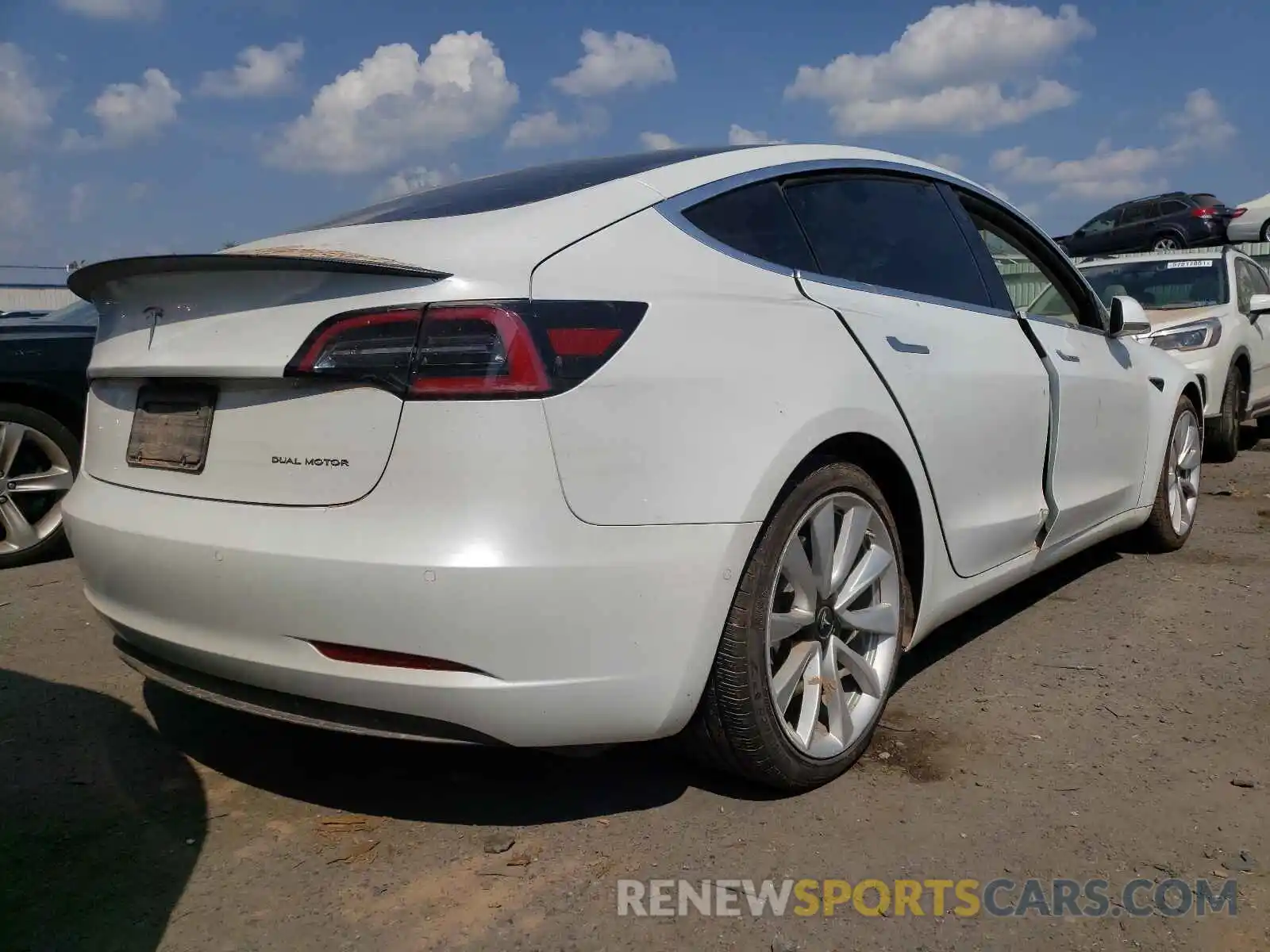 4 Photograph of a damaged car 5YJ3E1EB0LF667364 TESLA MODEL 3 2020