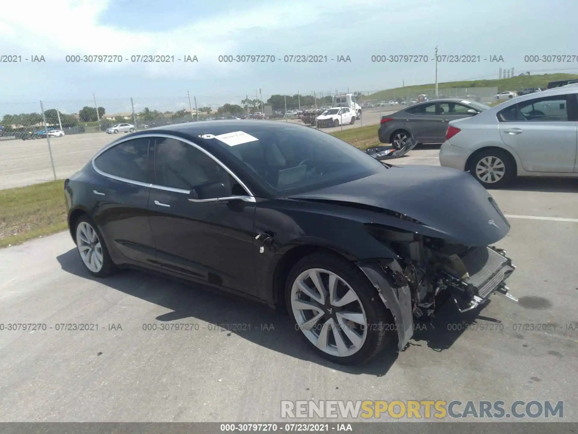 1 Photograph of a damaged car 5YJ3E1EB0LF668577 TESLA MODEL 3 2020