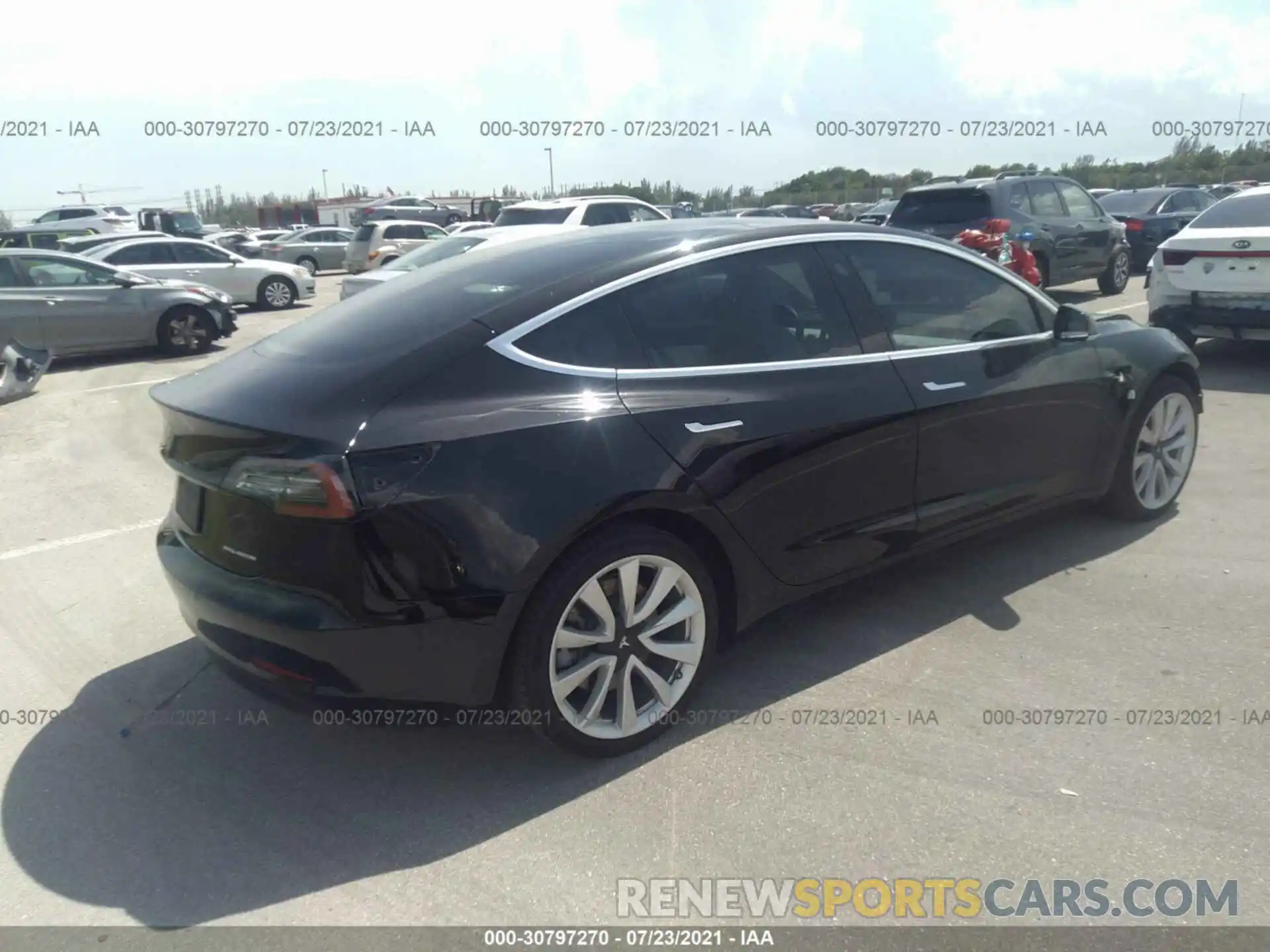 4 Photograph of a damaged car 5YJ3E1EB0LF668577 TESLA MODEL 3 2020