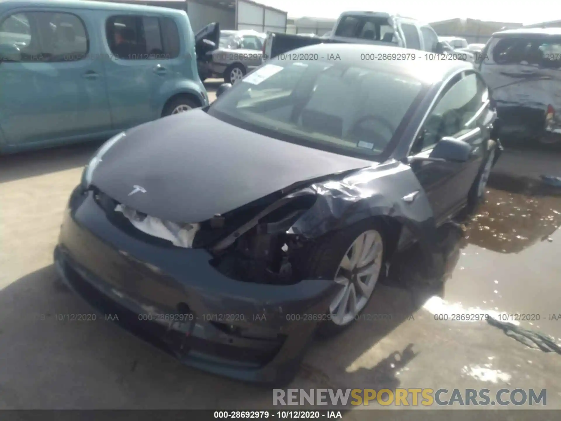 2 Photograph of a damaged car 5YJ3E1EB0LF668742 TESLA MODEL 3 2020