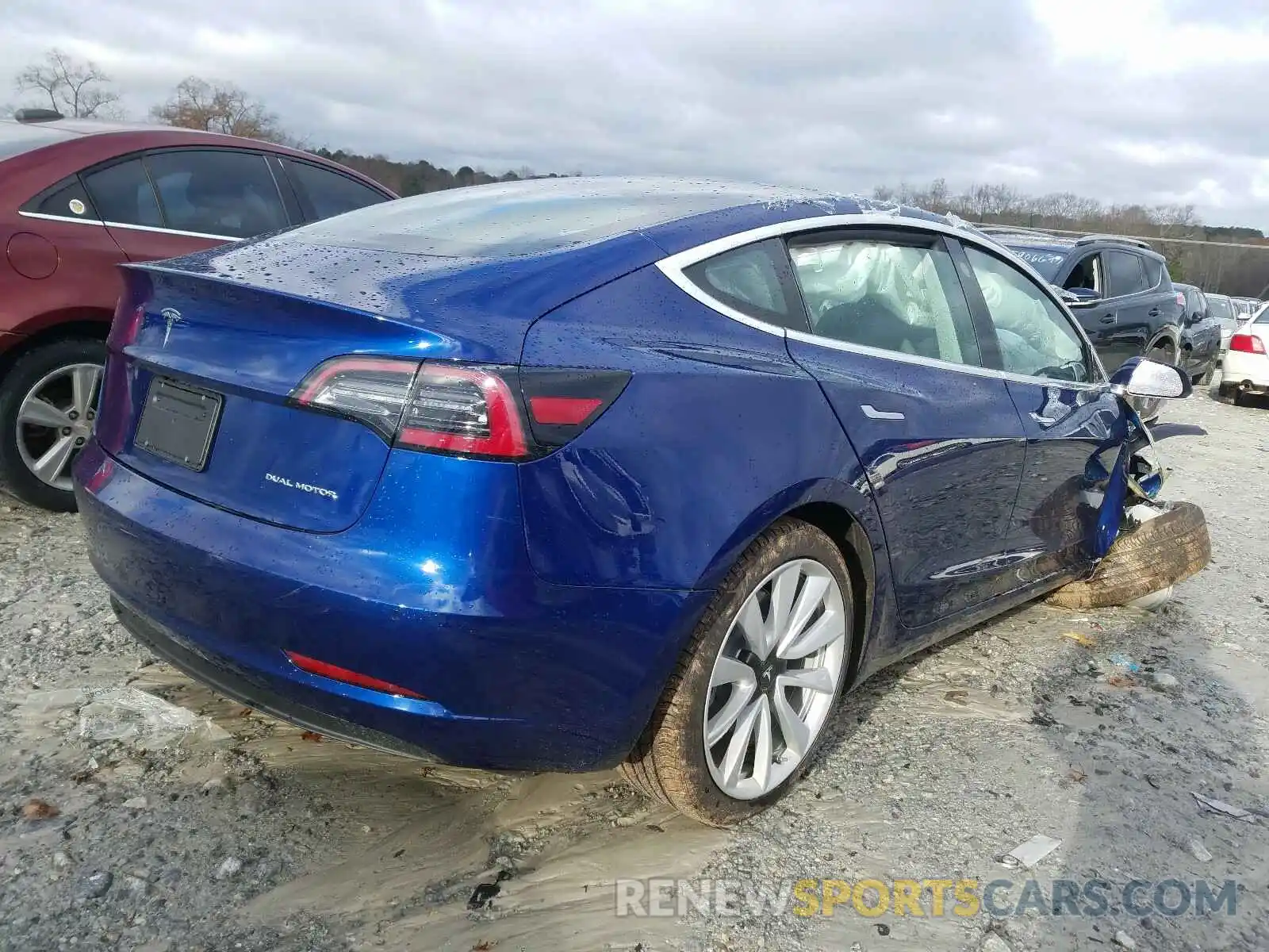 4 Photograph of a damaged car 5YJ3E1EB0LF712187 TESLA MODEL 3 2020